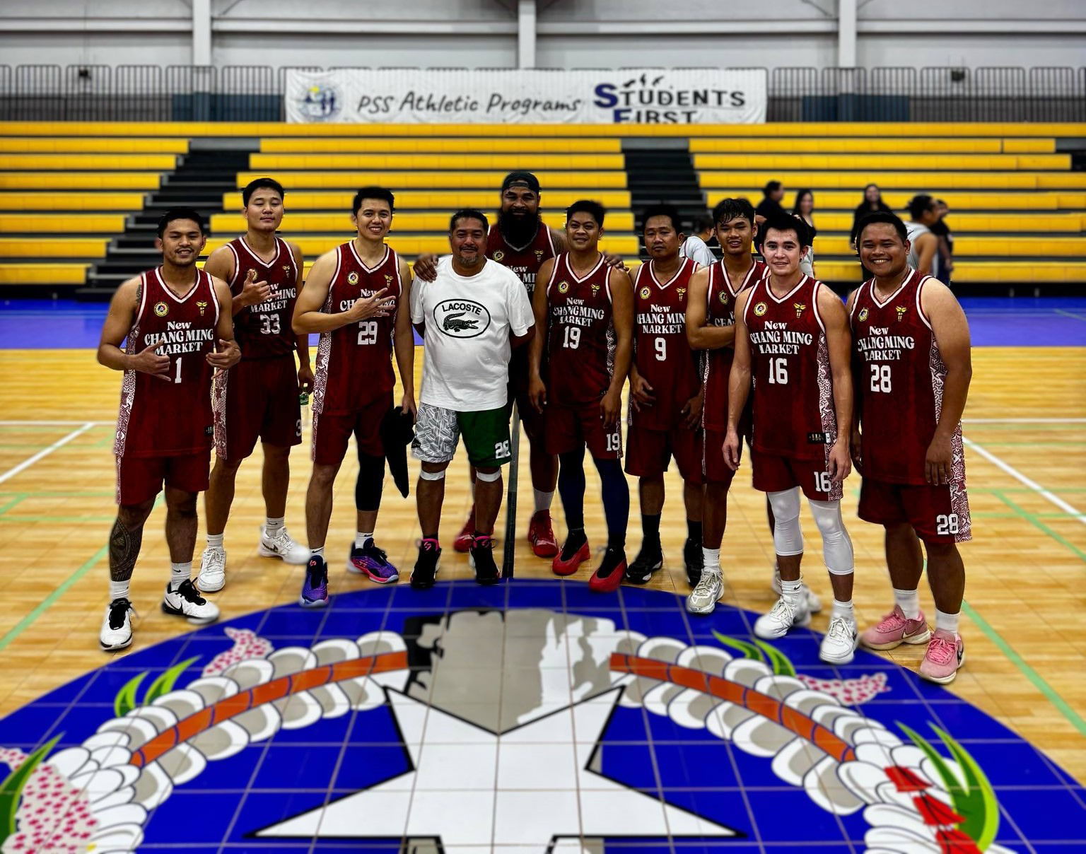 Changming Market players pose for a photo after defeating Priority Care in the open division of the 2025 IT&E United Filipino Organization Basketball League at the Ada gym on Wednesday.Contributed photo