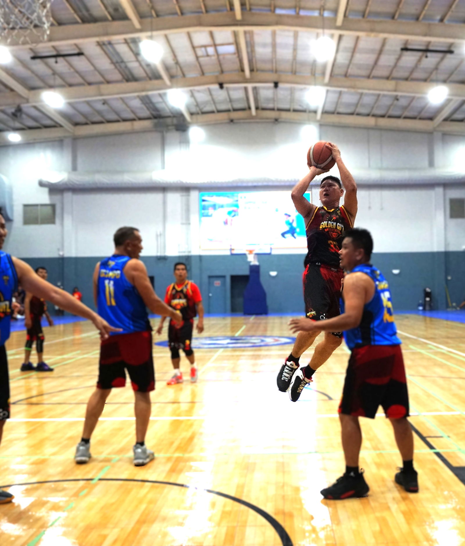 Golden Guyz North's Jorge De Guzman takes an off-balanced shot during the championship game against the Golden Guyz South in the masters division of the Alpha Kappa Rho 1st Semi-Open Invitational Basketball League 2025 at the Gilbert C. Ada Gymnasium on Sunday.Photo by James F. Sablan Jr. 