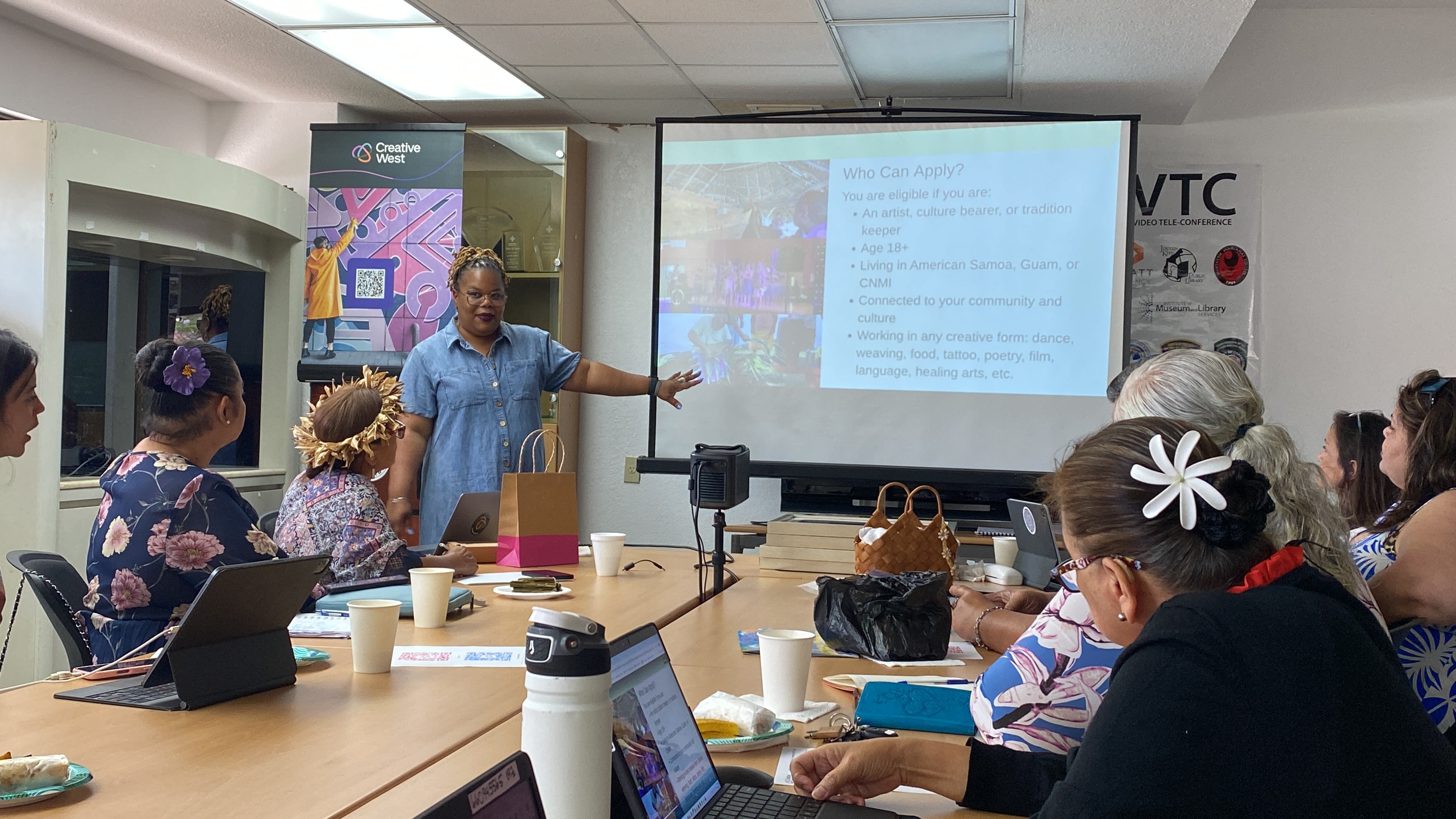 Creative West's Anika Tene, standing, encourages local artists to apply for the Pacific Jurisdictions Artist Fund.