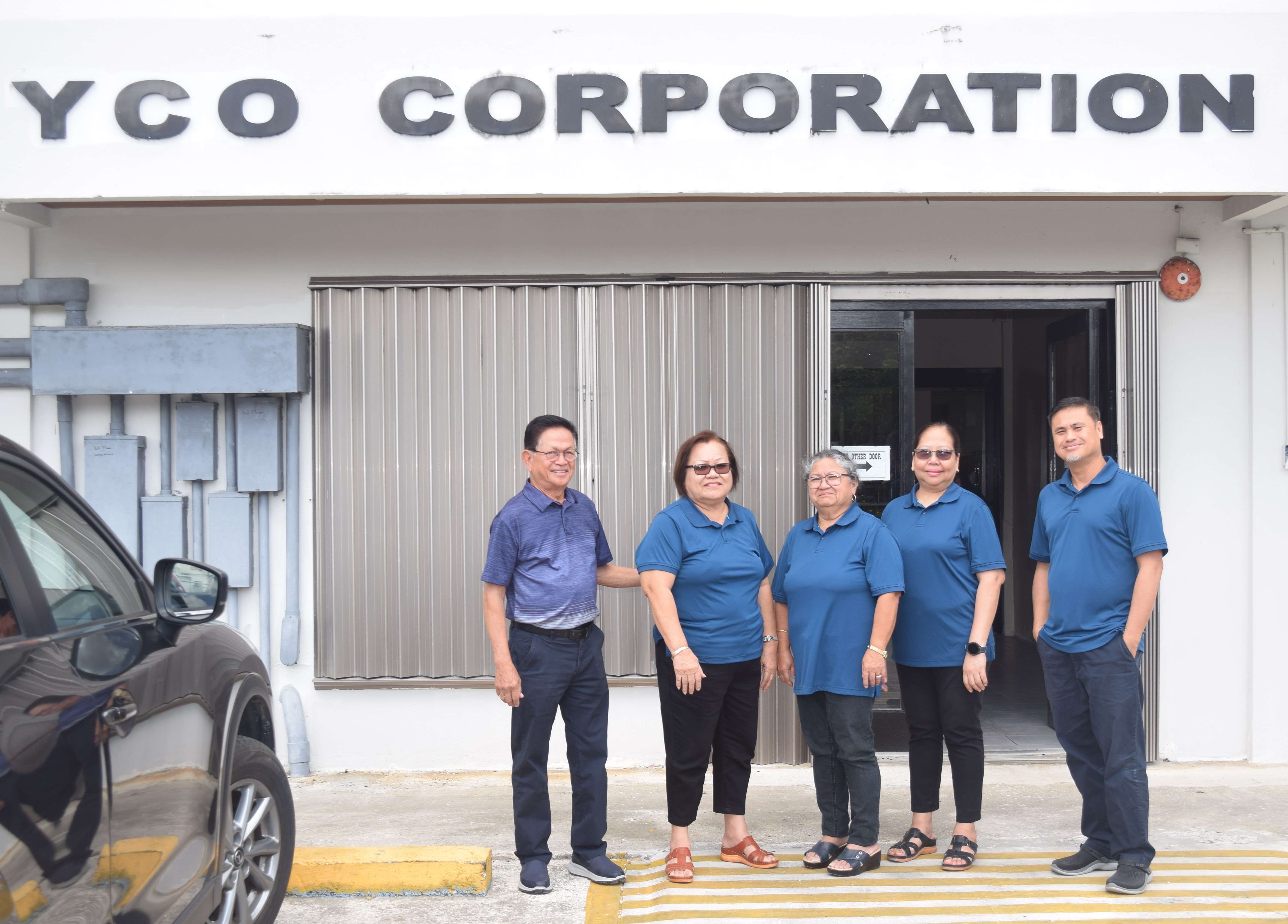 From left to right are YCO Corporation President Jess Yumul, office manager Maria Teresa L. Terlaje, and staff members Susana Tenorio, Guillerma Penalosa, and Arvin Bacani. 