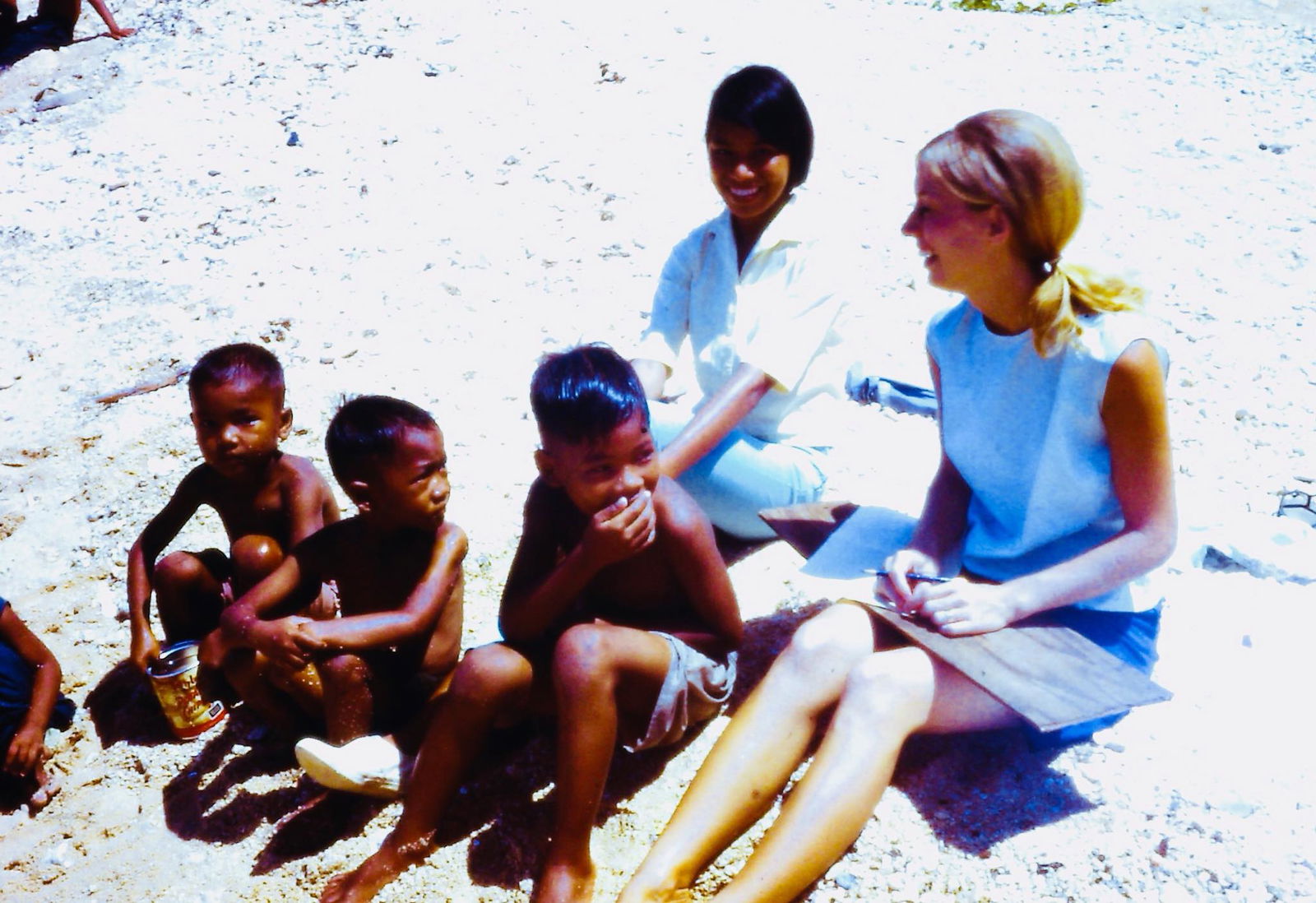 Undated photo. This is a photo from the Facebook page Mariana Memories-Micro of a Peace Corps volunteer with local children.