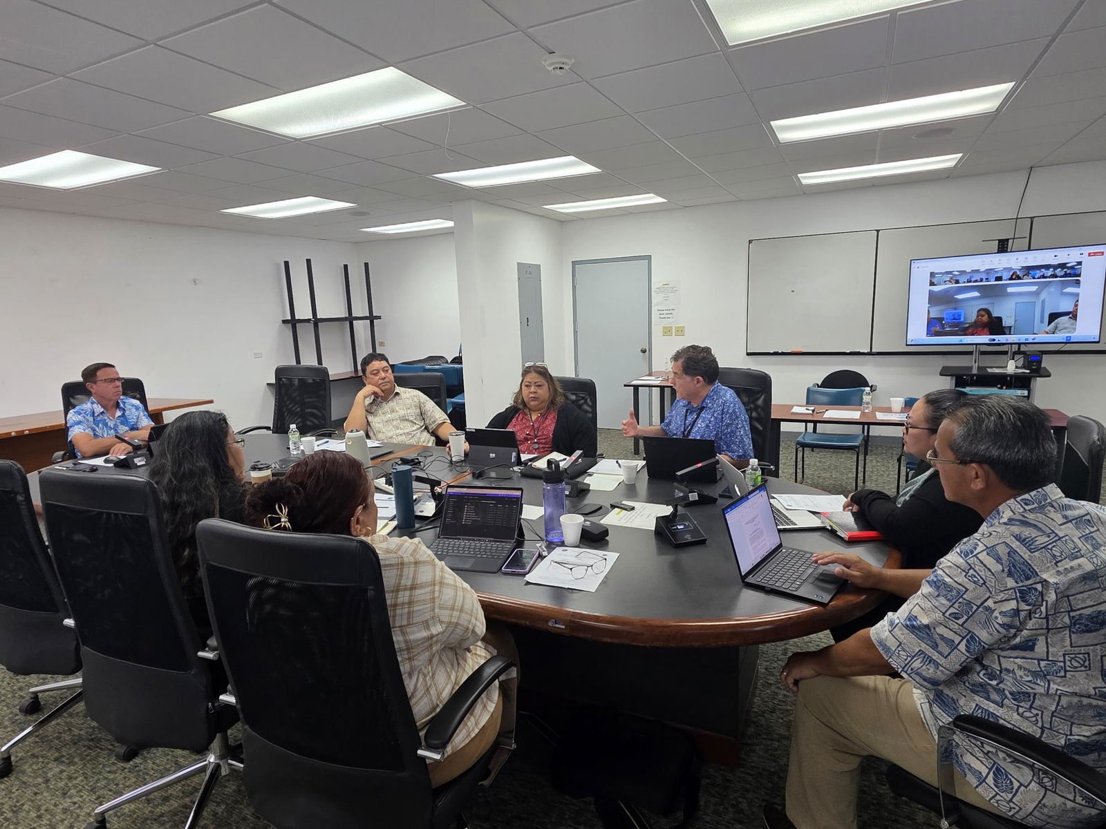 Commonwealth Utilities Corporation Executive Director Kevin Watson speaks during a meeting with the CUC board of directors on Thursday. Also in the photo are CUC Chief Financial Officer Betty Terlaje and other CUC managers.