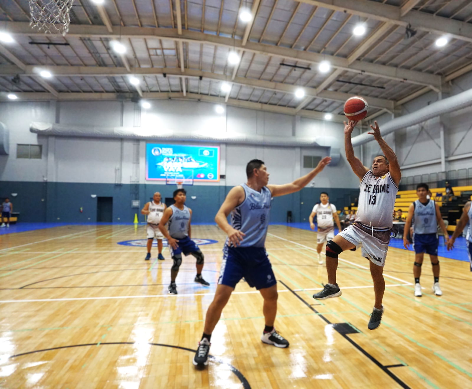 Water Front Oasis’ Elias Rangamar attempts a running shot during a game against Blue Haus in the masters division of the 2025 IT&E-United Filipino Organization Basketball League at the Ada gym on Saturday.Photo by James F. Sablan Jr.