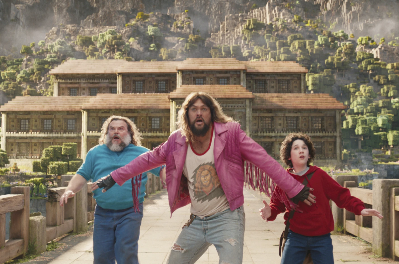 From left, Jack Black, Jason Momoa and Sebastian Hansen in a scene from “A Minecraft Movie.”Warner Bros. via AP