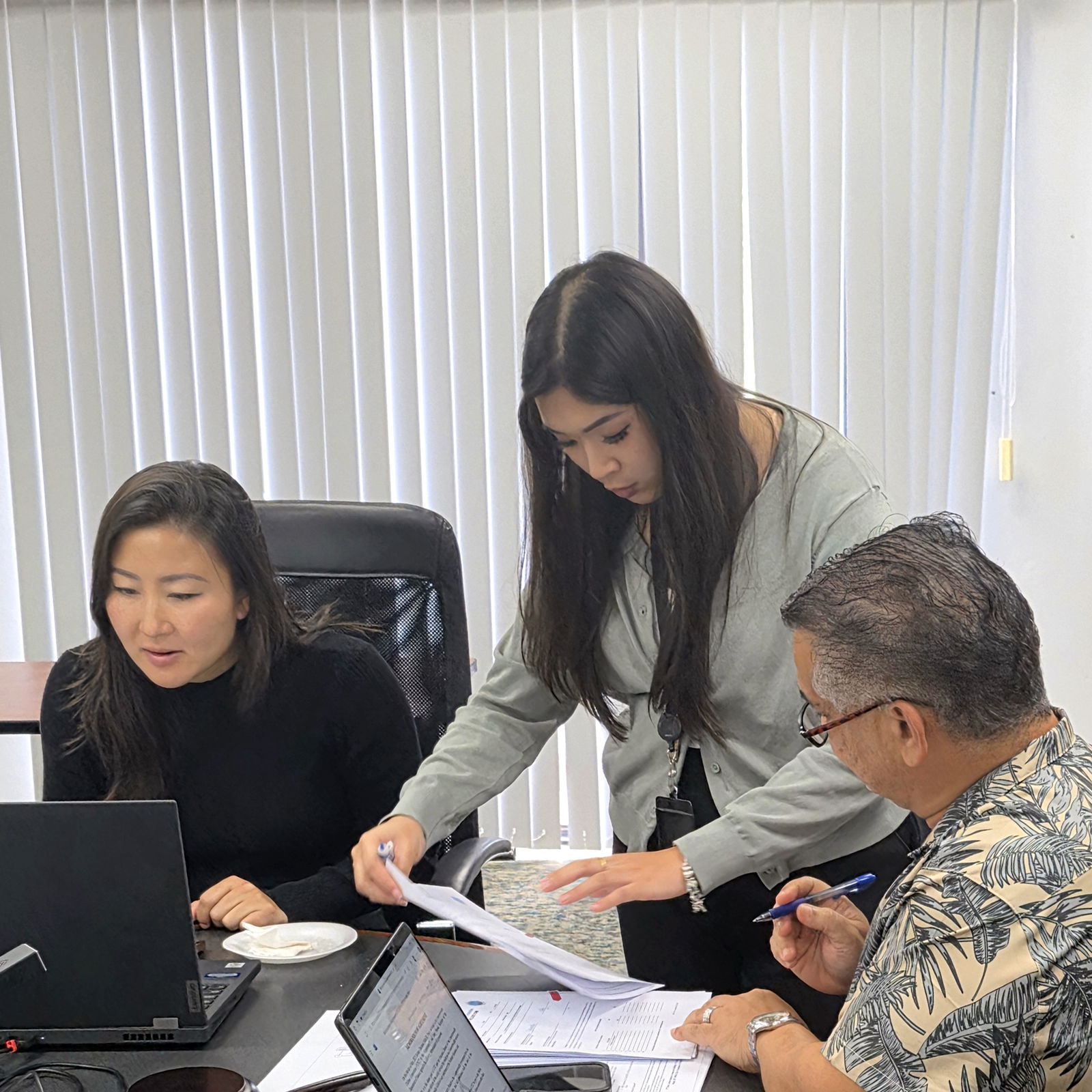 From left, CUC legal counsel Tina Ngo, administrative coordinator Riley Anne Buenaventura and the new CUC board chair, Allen Perez.Photo by Bryan Manabat
