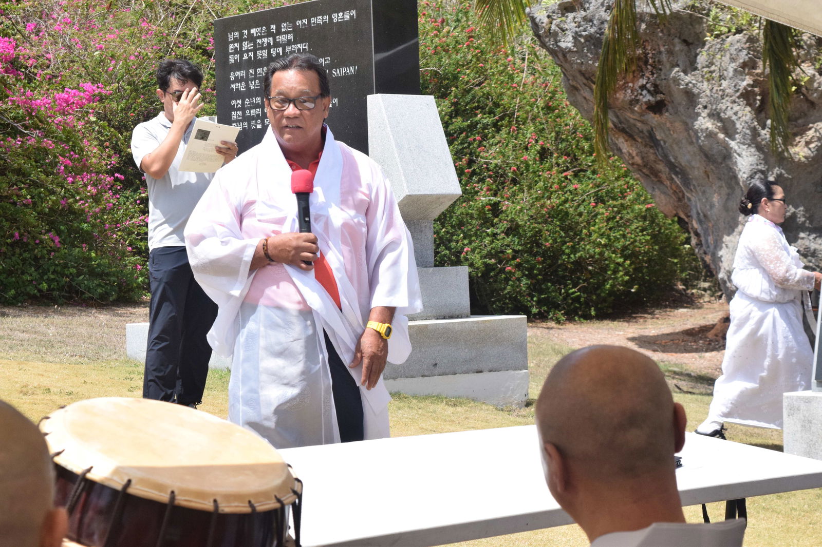 Saipan Mayor Ramon Blas RB Camacho delivers his remarks during a memorial service at the Korean Peace Memorial in Marpi on Monday.