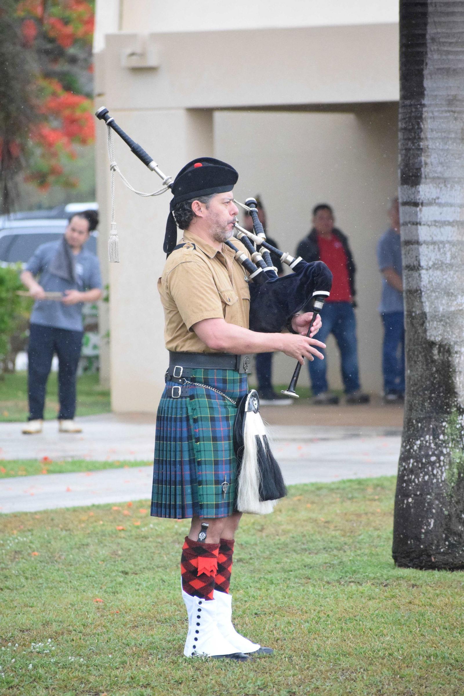 Sam Sosa plays the bagpipe.