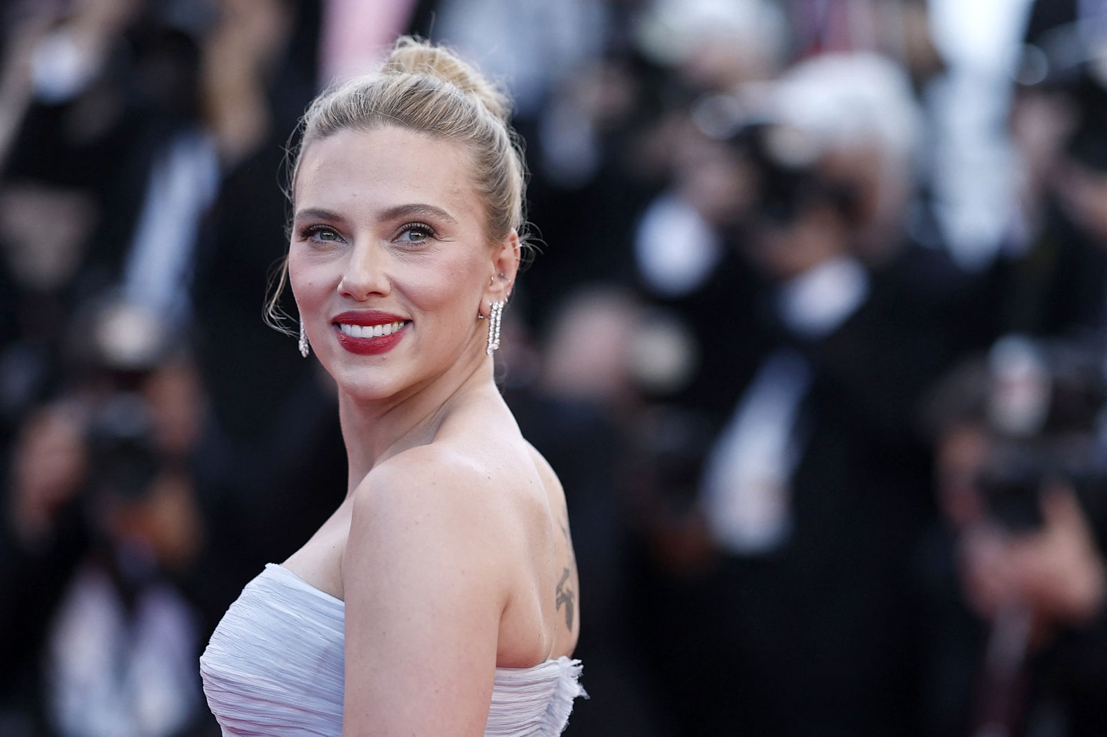 Scarlett Johansson, director of the film "Eleanor the Great" in competition for the category Un Certain Regard, poses on the red carpet during arrivals for the screening of the film "Vie privee" (A Private Life), out of competition at the 78th Cannes Film Festival in Cannes, France, May 20, 2025. 