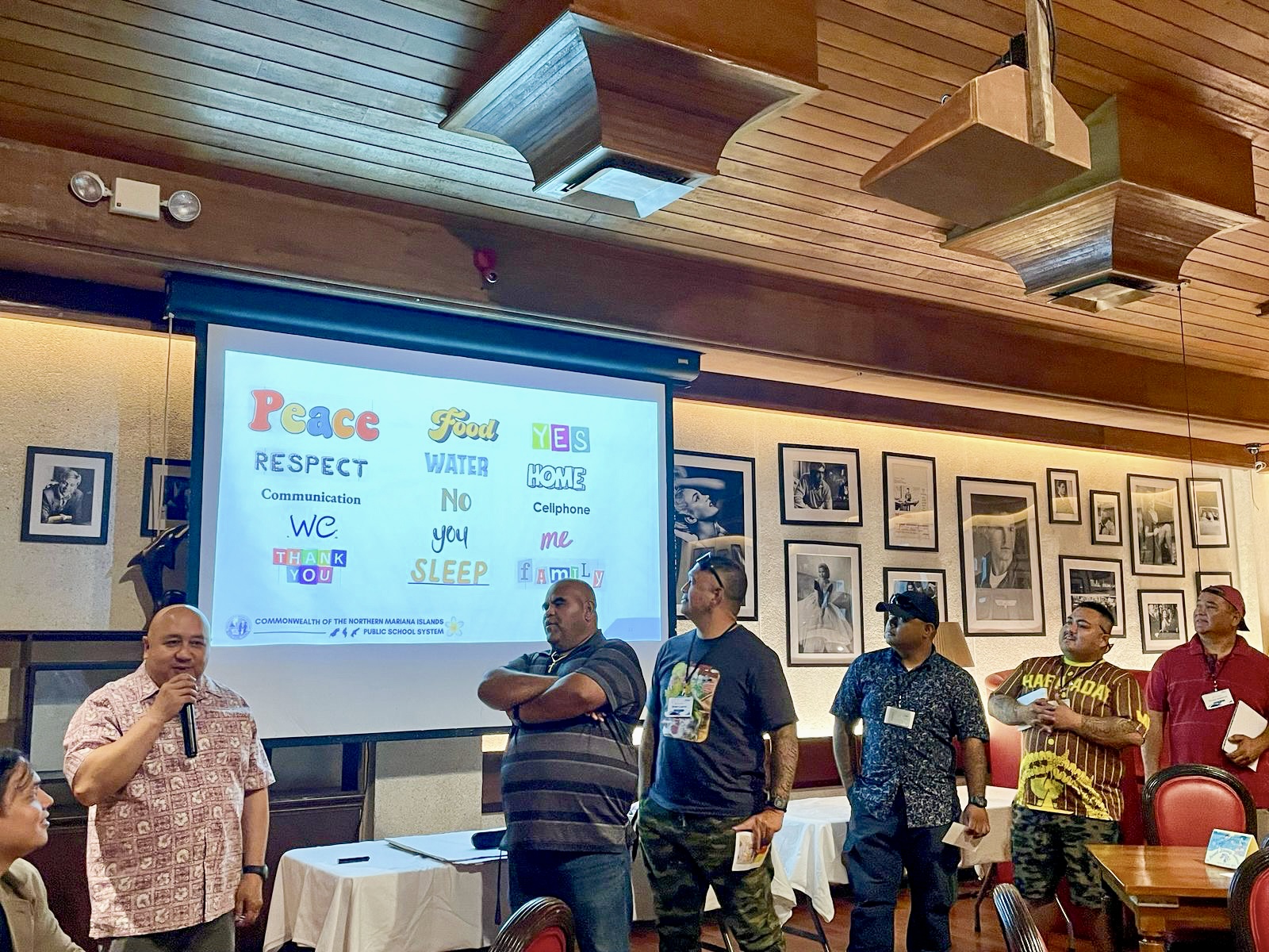 Commissioner of Education Dr. Lawrence F. Camacho speaks to parents during one of the summit sessions.