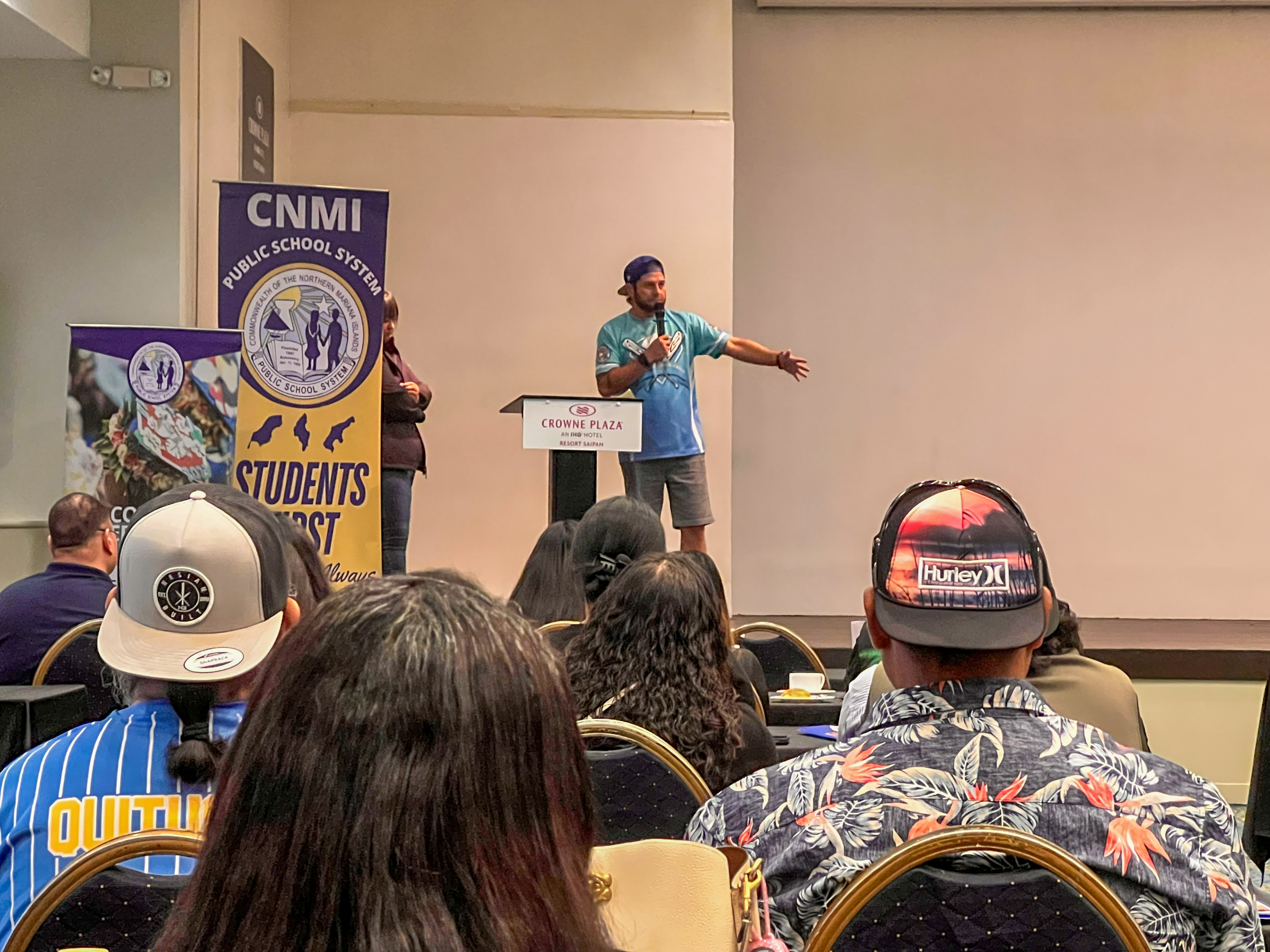 Student Attendance Review Committee Coordinator Bob Coldeen gestures as he explains the role played by SARC.