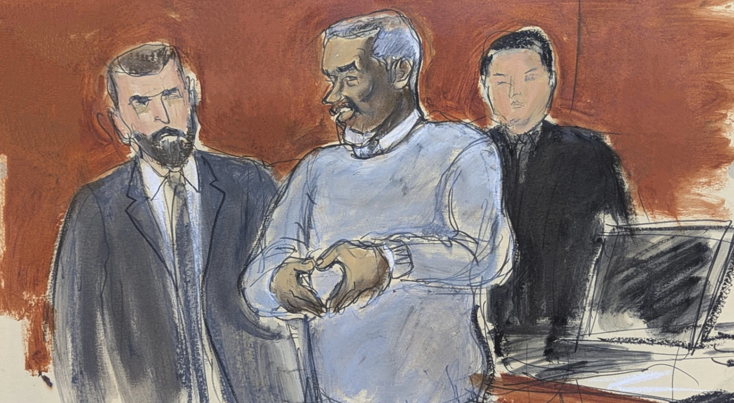 Sean “Diddy” Combs, center, motions a heart sign to his family in attendance as he is escorted out of lock-up by U.S. Marshals on the first day of trial, Monday, May 12, 2025 in New York.AP