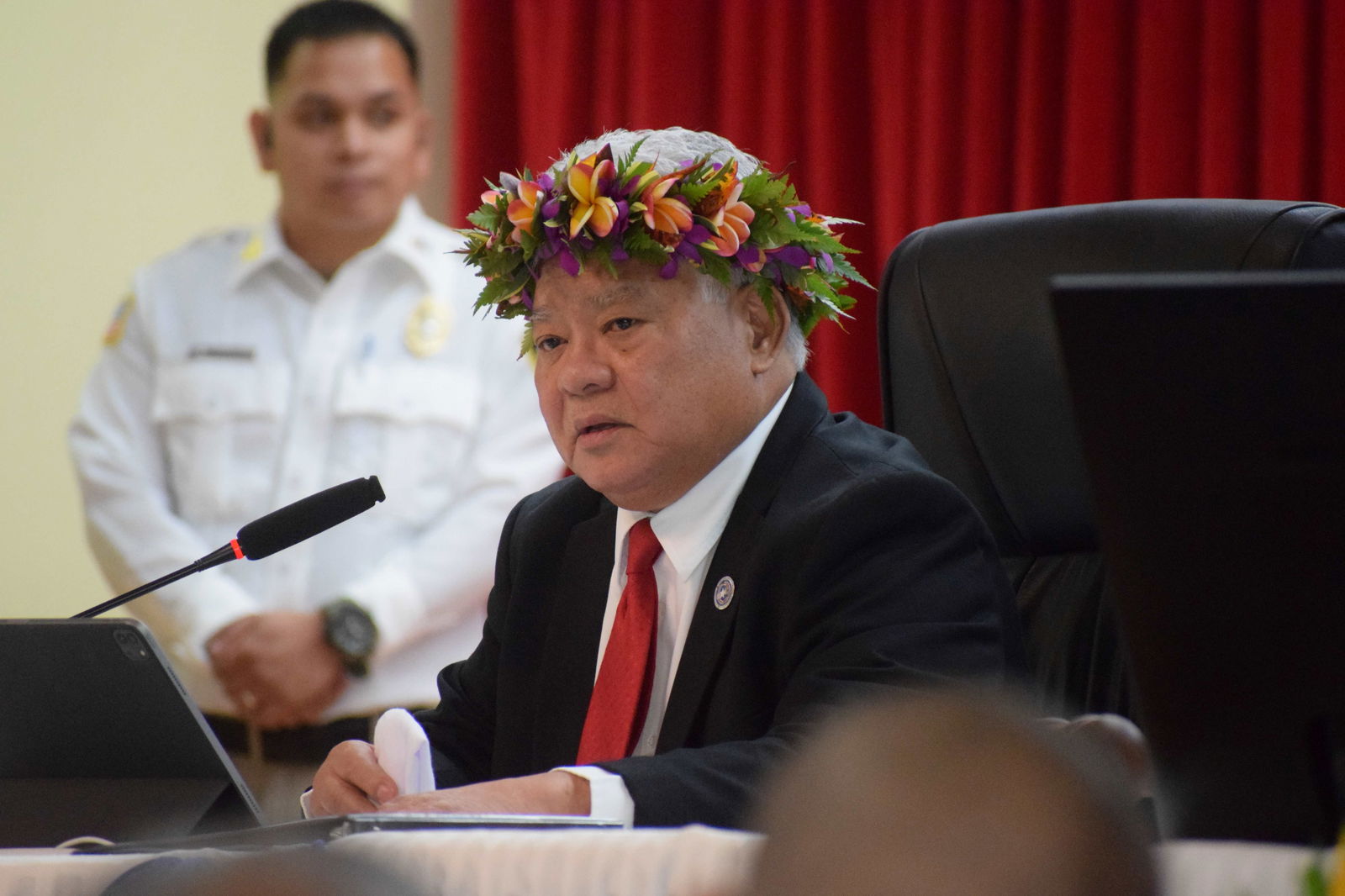 Gov. Arnold I. Palacios, center, delivers his first State of the Commonwealth Address.