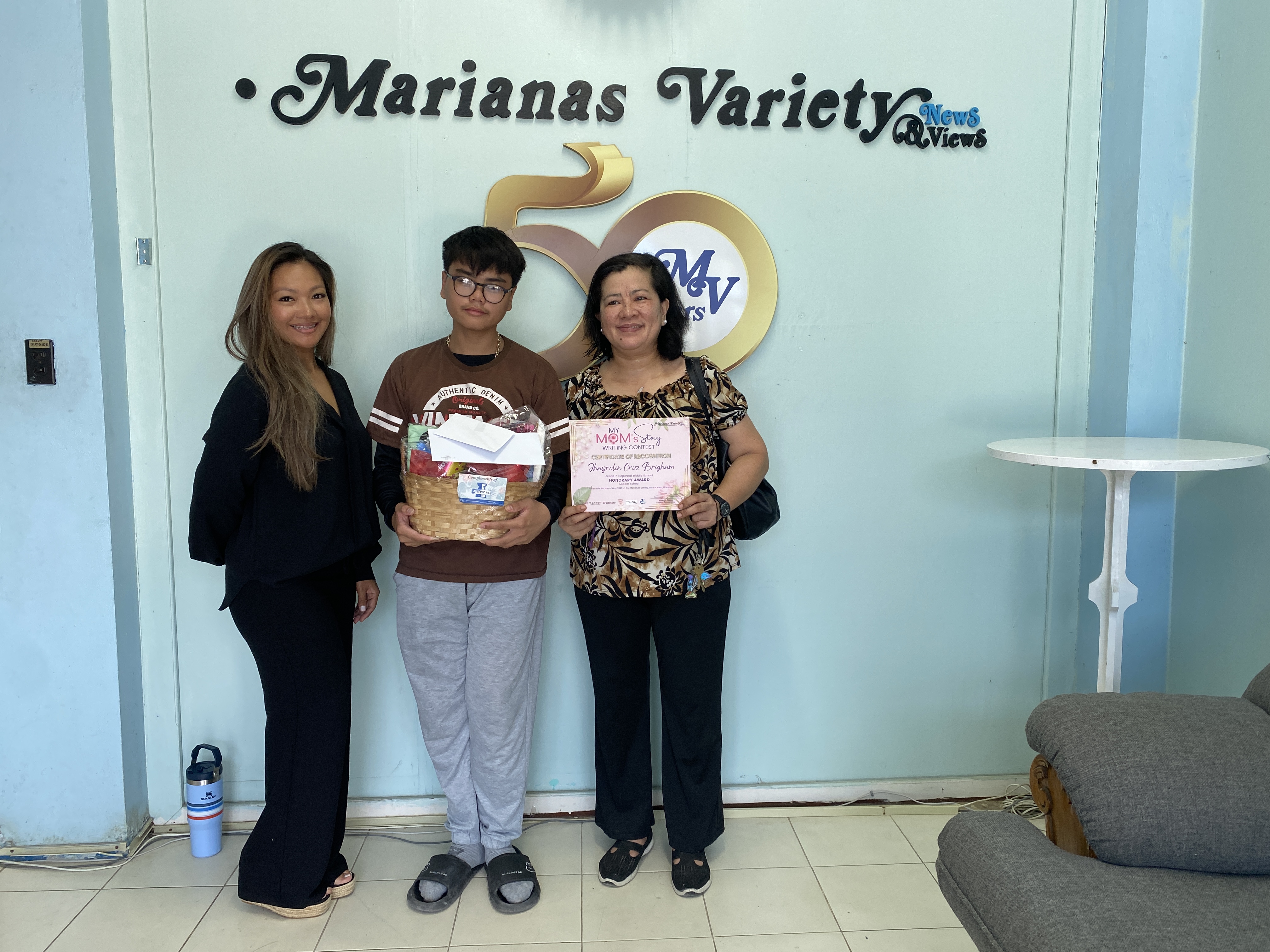 Jhayrolin Cruz, center.