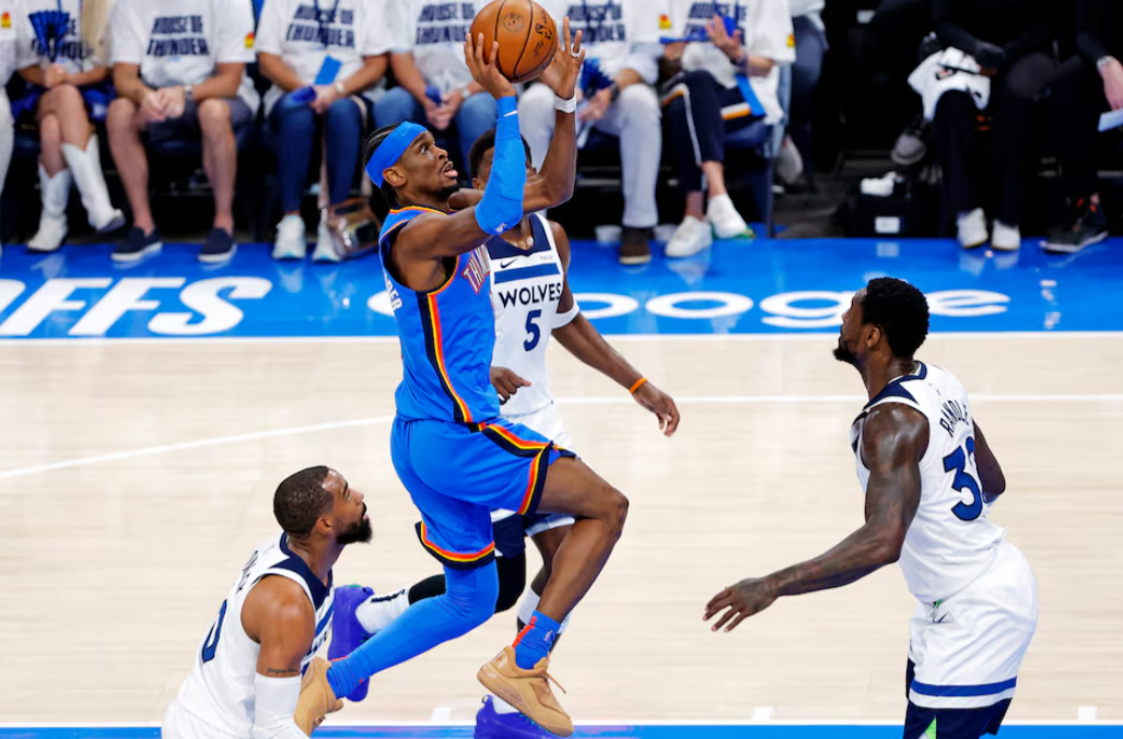Oklahoma City Thunder guard Shai Gilgeous-Alexander (2) shoots the ball against Minnesota Timberwolves guard Mike Conley (10) during the first quarter in game five of the western conference finals for the 2025 NBA Playoffs at Paycom Center in Oklahoma City, Oklahoma, May 28, 2025.Photo by Alonzo Adams/Imagn Images