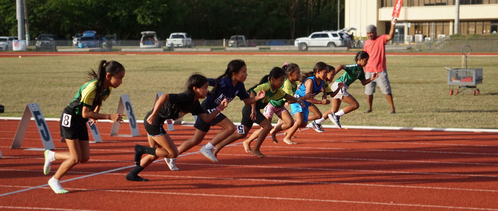 Participants take off from the starting line during the girls 9U 100m event of the PSS-McDonald’s All School Track and Field SY24-25 at the Oleai Sports Complex on Saturday.Photo by James F. Sablan Jr.