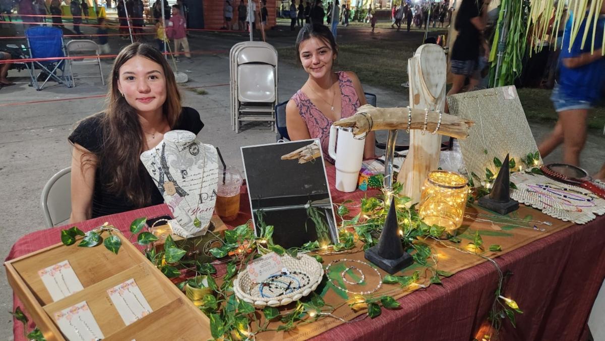 Local artisans and craftspeople sell their products at the 26th Annual Taste of the Marianas International Food Festival on May 3, 2025, in Saipan. The annual signature event of the Marianas Visitors Authority featuring food, drinks, arts & crafts, and live entertainment will be held every Saturday evening in May at American Memorial Park, Garapan.
