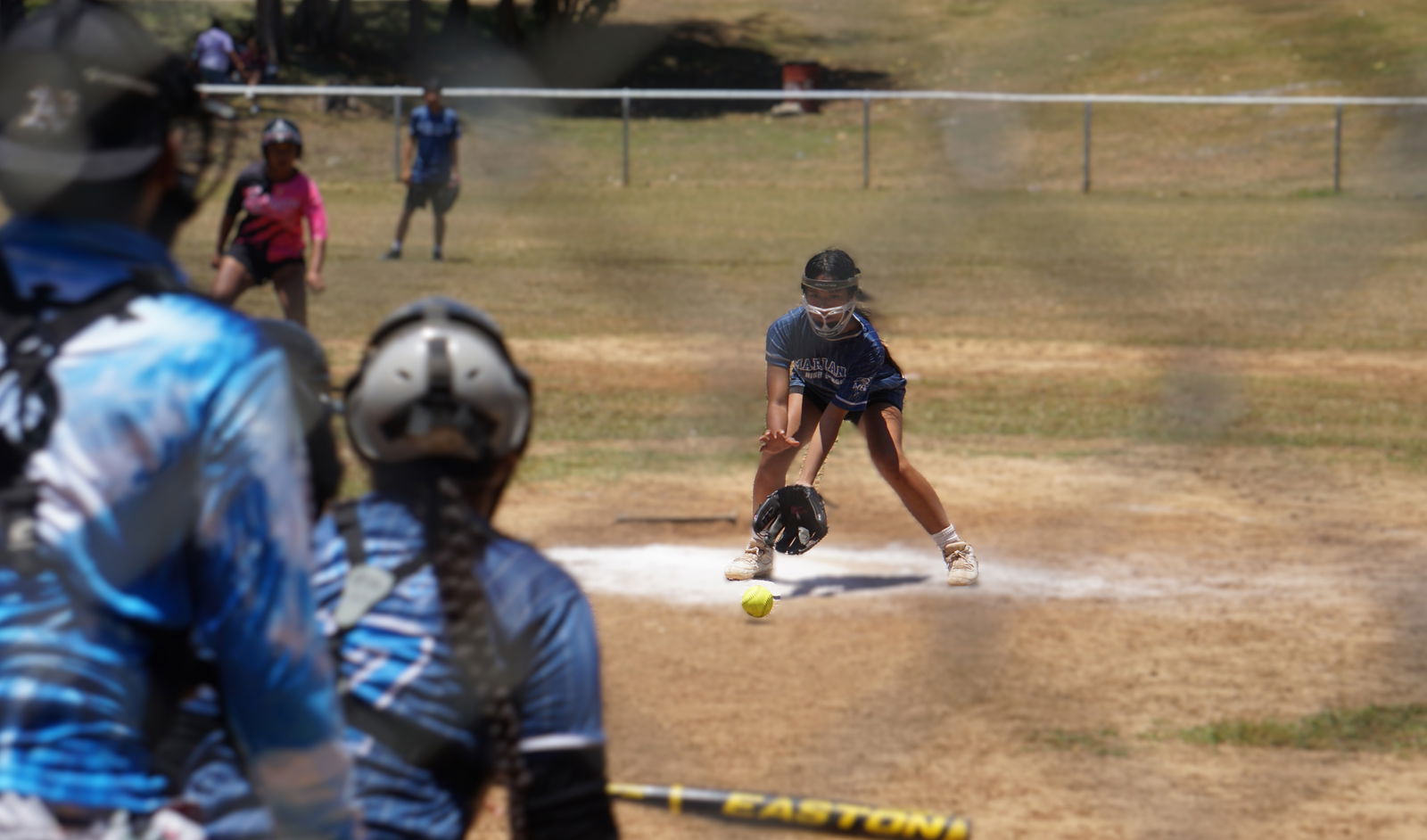 Marianas High School pitcher Paulette Somol secures a grounder against Kagman High School in the girls high school division title game of the PSS-NMISA Interscholastic Fastpitch Softball League SY24-25 at the Capital Hill ball field on Saturday.Photo by James F. Sablan Jr.