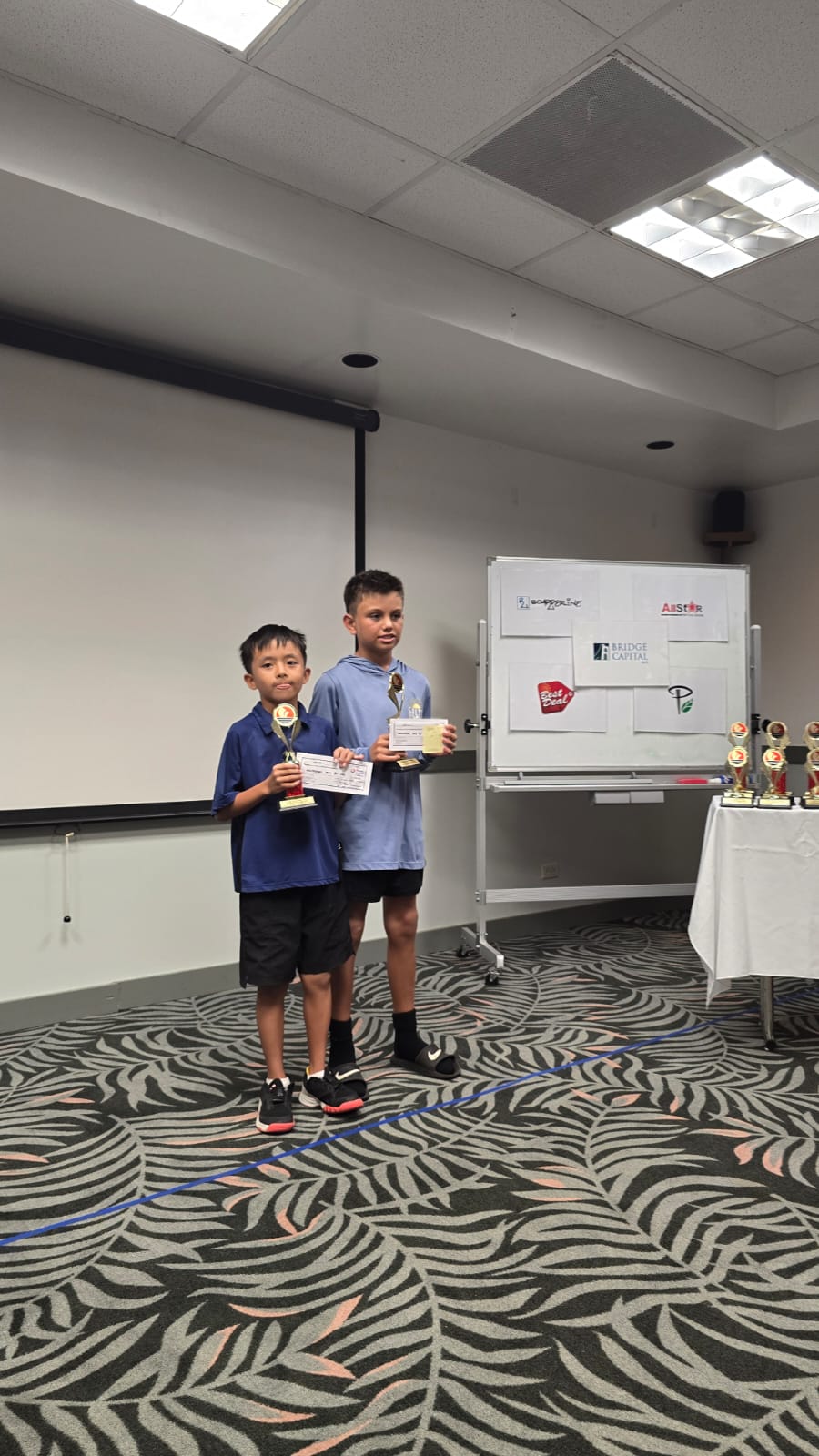 Isaiah Mook and Evan Zhang are the 12U Boys Doubles champions of the PIC 2025 Tennis Championships.