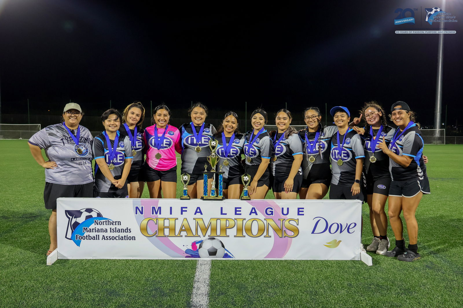 MP United Football Club Pink players pose with the B Division championship trophy during the awards ceremony of the Dove Women’s League Spring 2025 at the NMI Soccer Training Center in Koblerville on Sunday.NMIFA photo