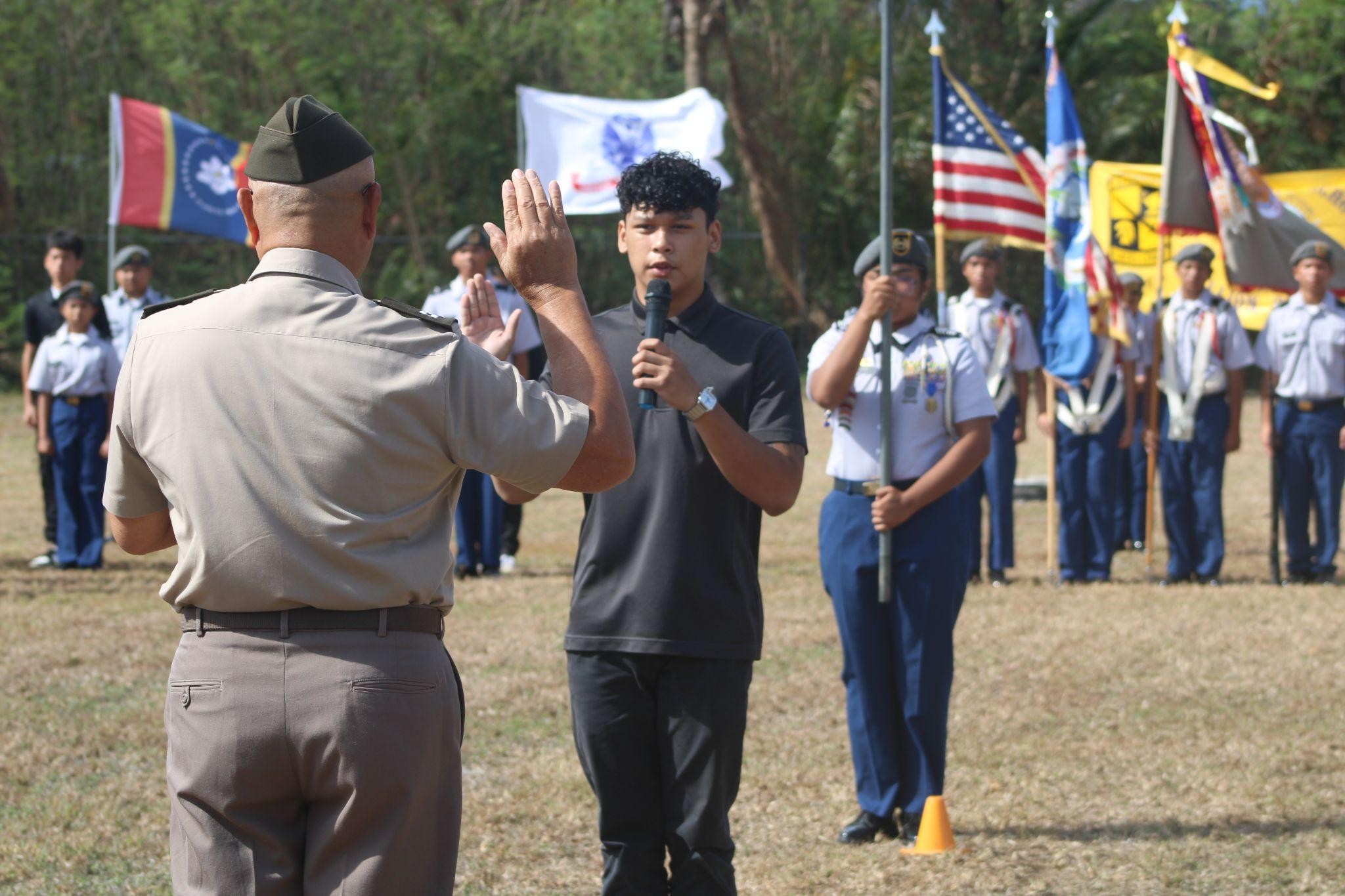 Abiel Erickson recites his pledge during the ceremonial swearing-in.Photo by C/2LT Juris Cabarles