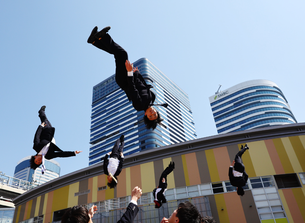 Members of Cheer Re-Man’s, an all-male cheer-leading team of active businessmen, perform at “Cheer Up Japan” in Tokyo, Japan, March 22, 2025.REUTERS