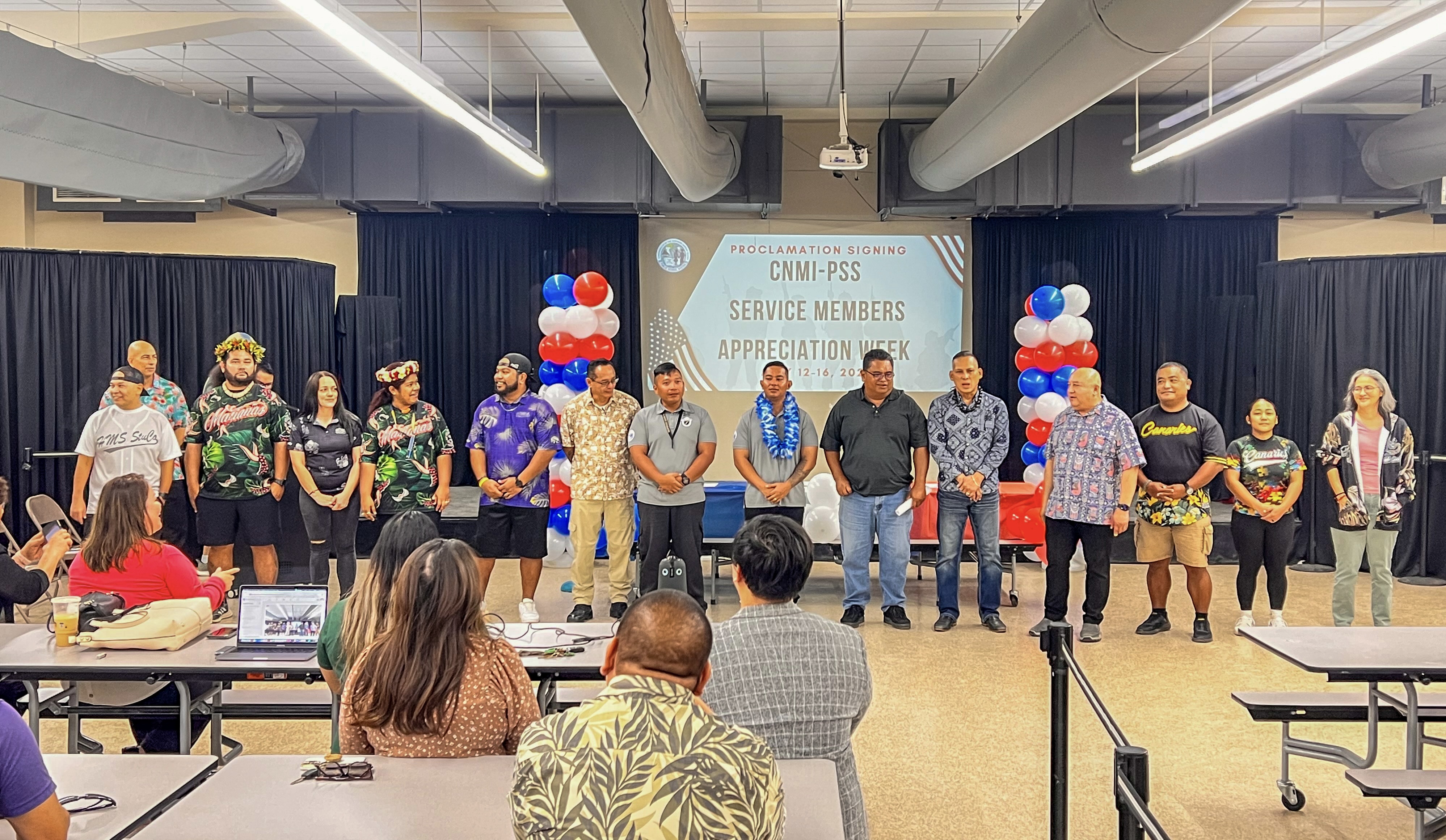 Commissioner of Education Dr. Lawrence F. Camacho, a retired Army lt. colonel, recognizes the PSS service members who are with the U.S. Army.
