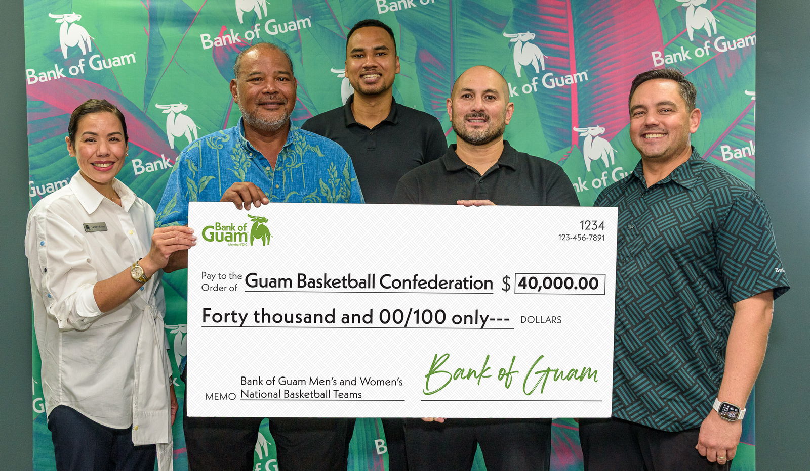 Bank of Guam announces its renewed partnership and Signature Level sponsorship of $40,000 with Guam Basketball Confederation for the Bank of Guam Men’s and Women’s National Basketball Teams. Pictured, from left, Lesley-Anne Leon Guerrero, senior vice president, chief experience officer, Bank of Guam; Frank Cruz, secretary general and vice president, GBC; Mark Johnson, executive director, GBC and Bank of Guam’s Men’s Basketball Team; EJ Calvo, president, GBC; and Joaquin P. L.G. Cook, President and Chief Executive Officer, Bank of Guam.BoG photo