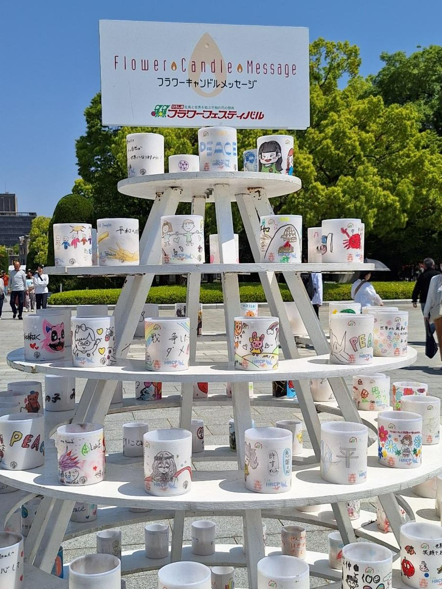 Candles for peace from school children are displayed at Hiroshima Flower Festival 2025 on May 3-5, 2025, in Hiroshima, Japan. The Marianas Visitors Authority had a promotional booth and presented Carolinian dances at the festival to promote The Marianas.