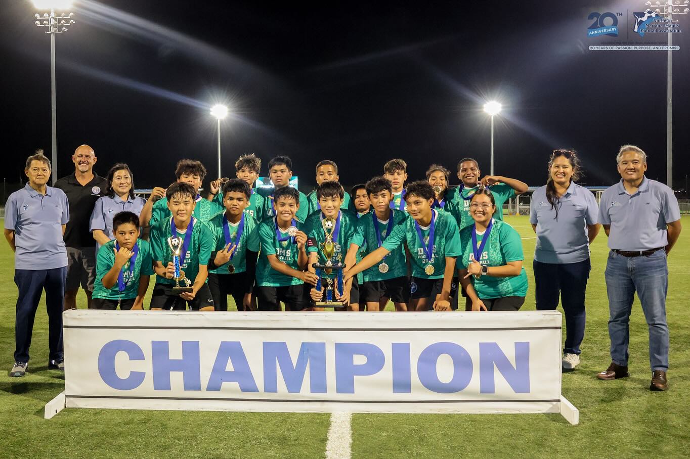 Dandan Middle School players pose with the boys middle school championship trophy of the PSS-NMIFA Interscholastic Soccer League SY24-25 at the NMI Soccer Training Center in Koblerville on Thursday.NMIFA photo