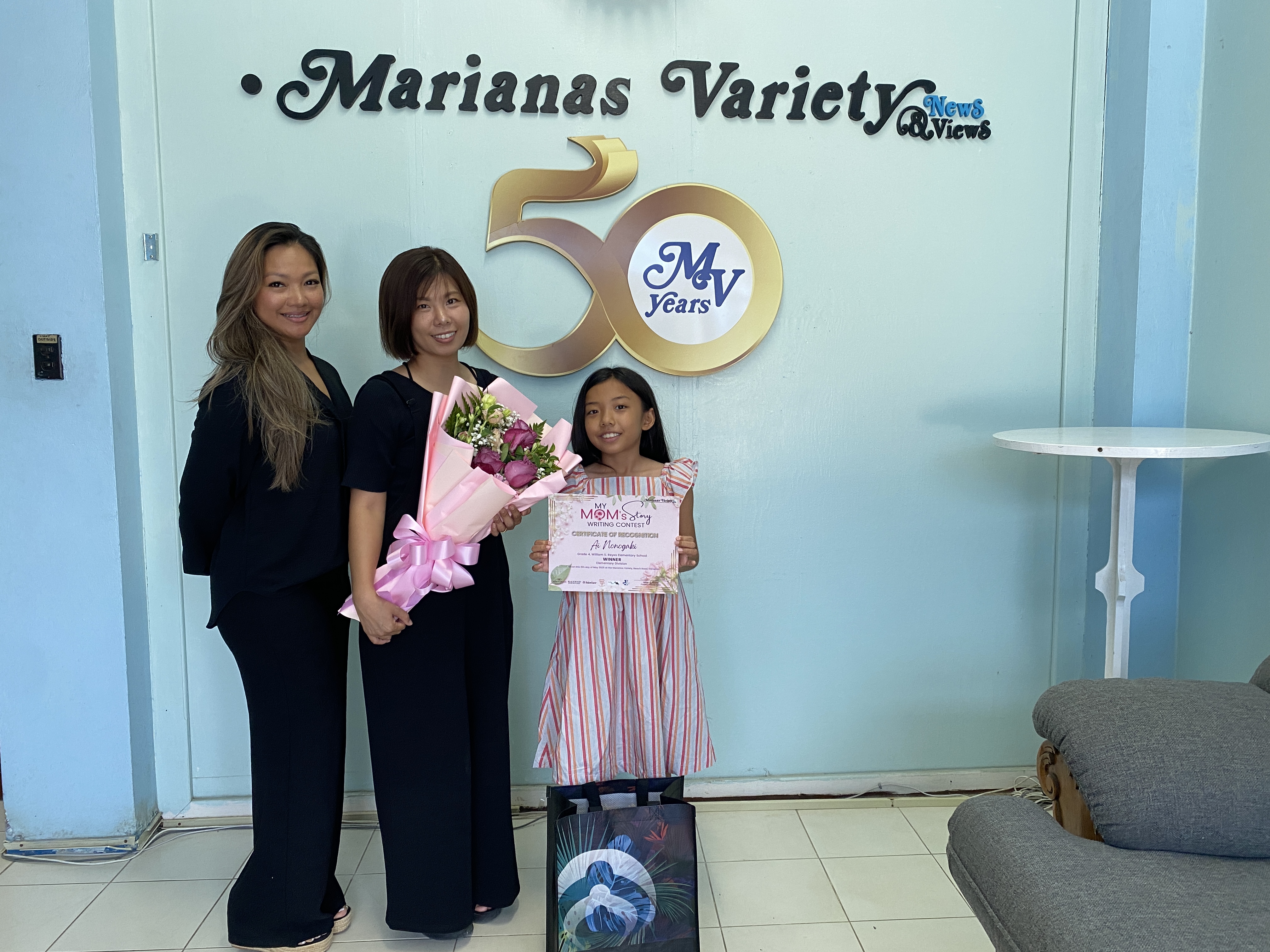 Ai Nonogaki, right, and her mother, center. 