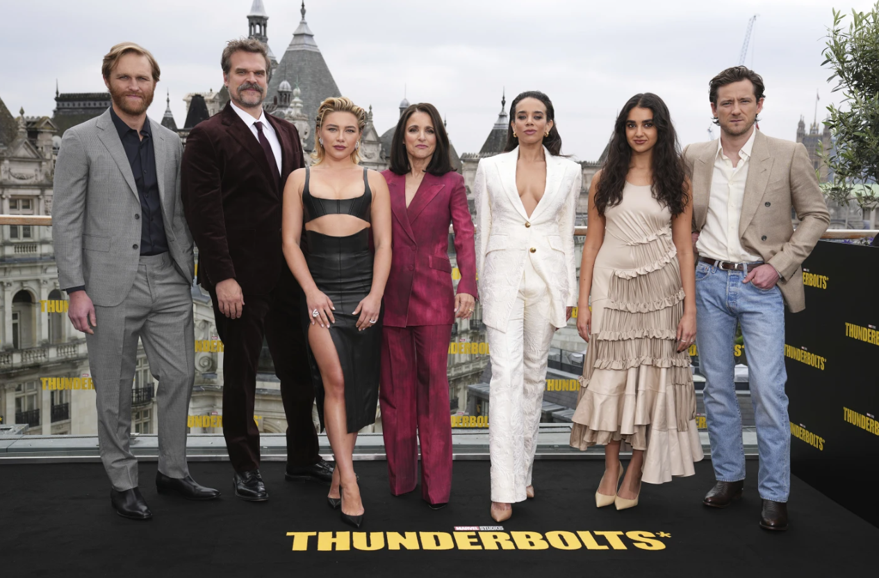 Wyatt Russell, from left, David Harbour, Florence Pugh, Julia Louis-Dreyfus, Hannah John-Kamen, Geraldine Viswanathan and Lewis Pullman pose for photographers at the photo call for the film 'Thunderbolts' on Thursday, April 24, 2025, in London.AP