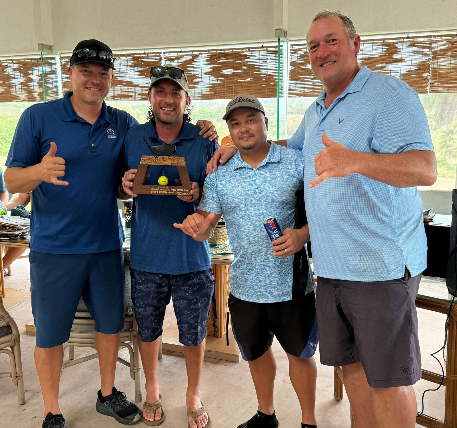 Fore Loko's Dan Wollak, Ben Deleon Guerrero, John Favreaux, and Steve Beyer pose with the perpetual championship trophy of the Wollak Golf Classic at the Kingfisher Golf Links on Sunday.Contributed photo