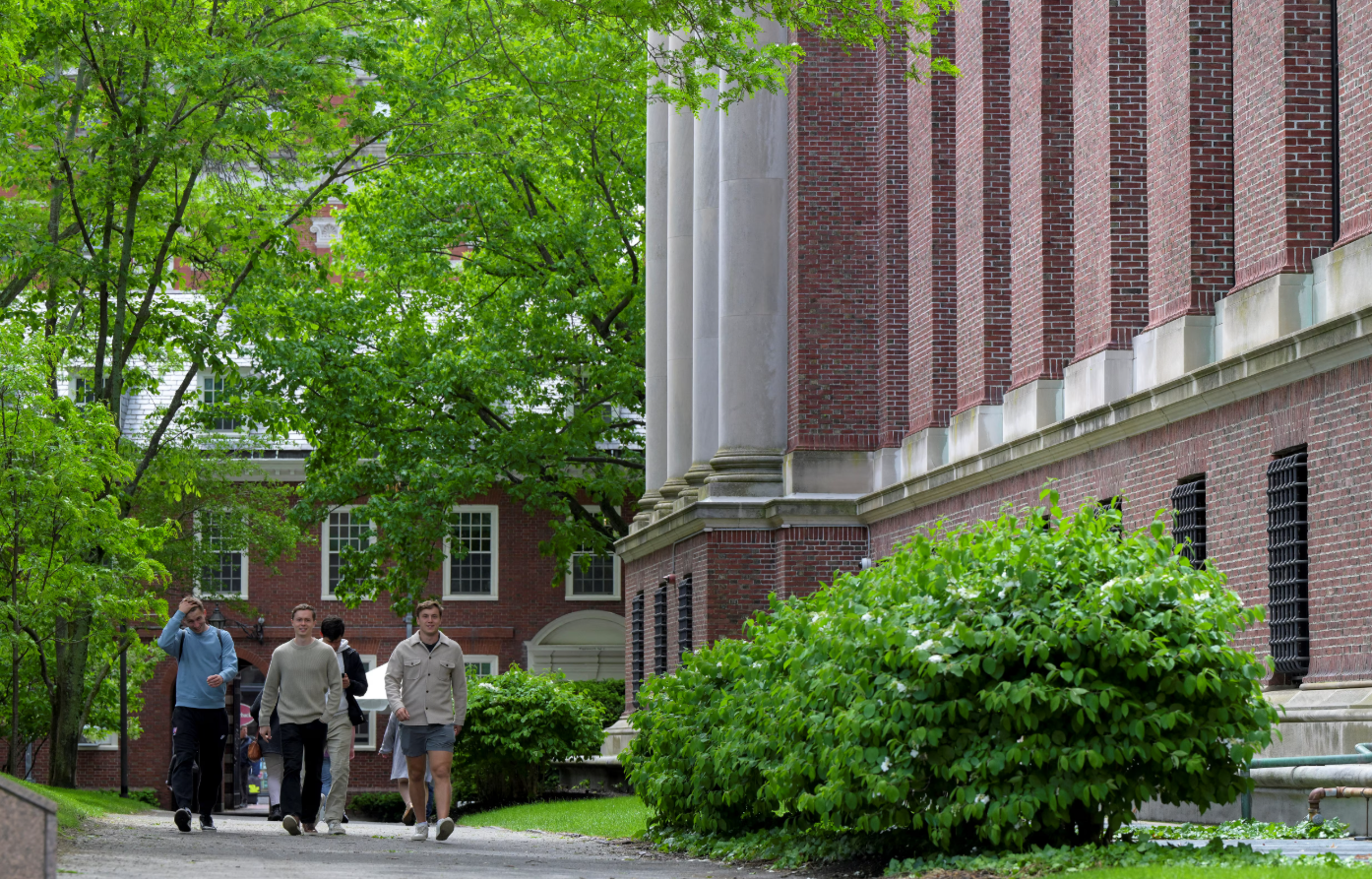 Students walk on the campus of Harvard University in Cambridge, Massachusetts, May 23, 2025.REUTERS