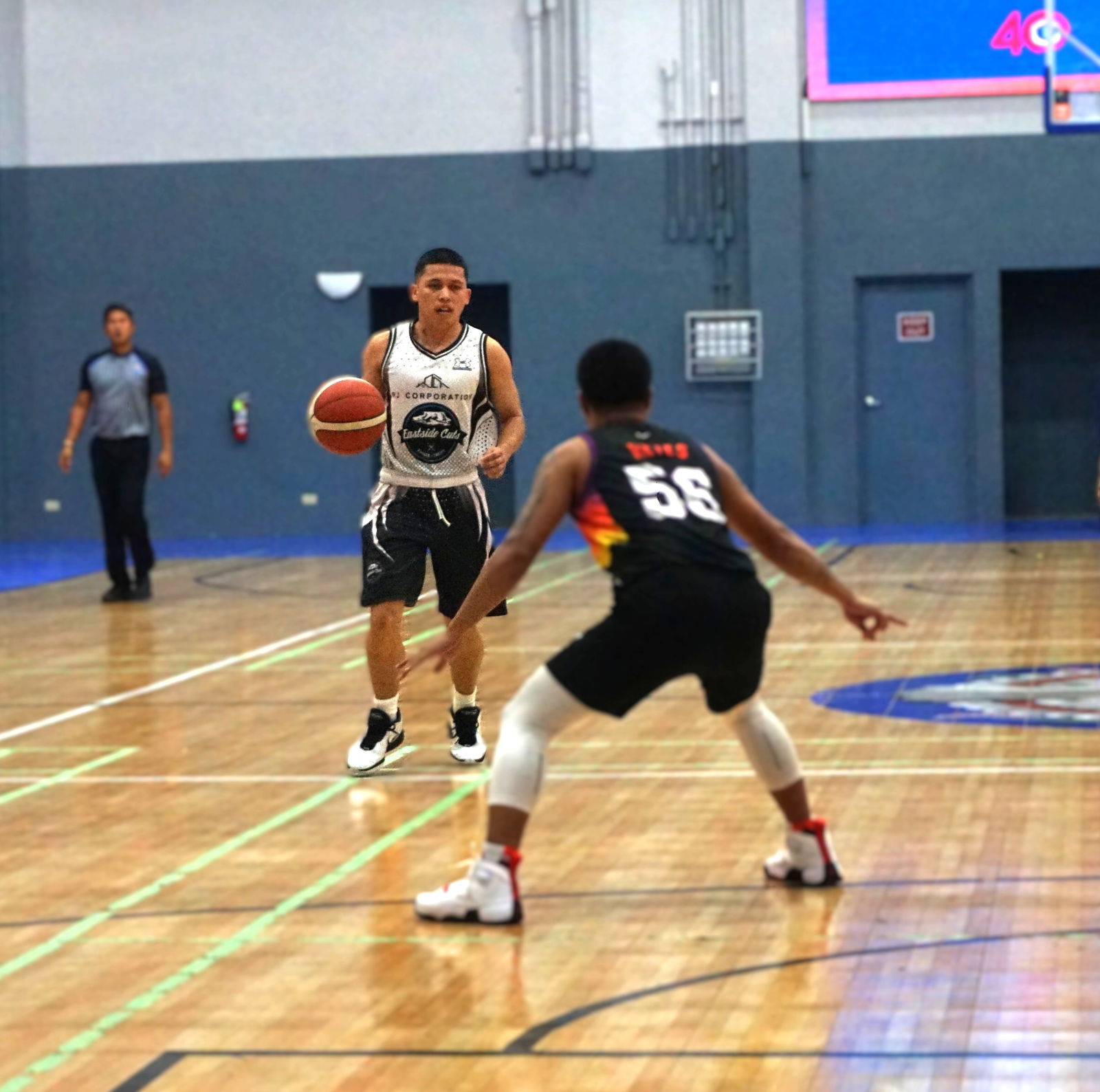 Eastside Cuts’ Gringo Deleon Guerrero sizes up his defender during a Michelob Ultra Cup 2025 game at the Ada gym.Photo by James F. Sablan Jr.