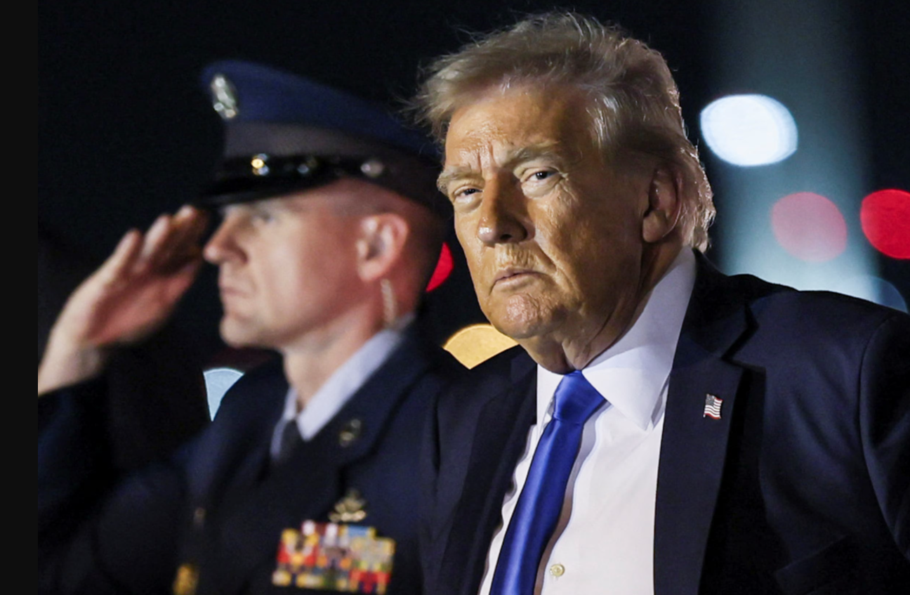 President Donald Trump looks on after disembarking from Air Force One at Palm Beach International Airport, West Palm Beach, Florida, May 1, 2025.REUTERS