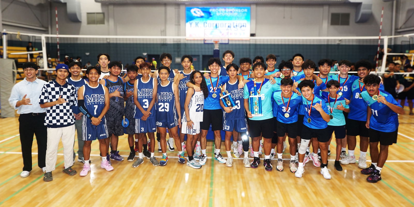 Marianas High School and Saipan International School players pose for a group photo.