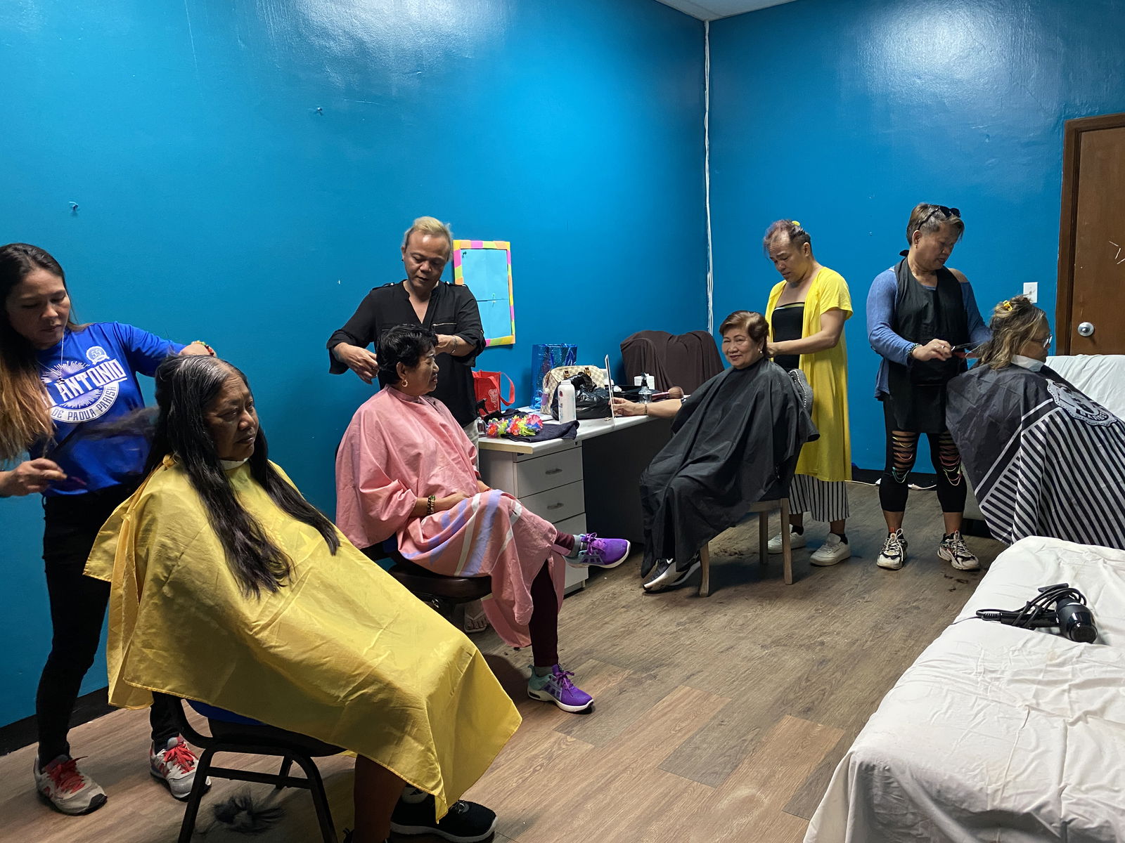 Hair stylists from Ambience Salon & Rejuvenate Salon provide free services to the manamko’.