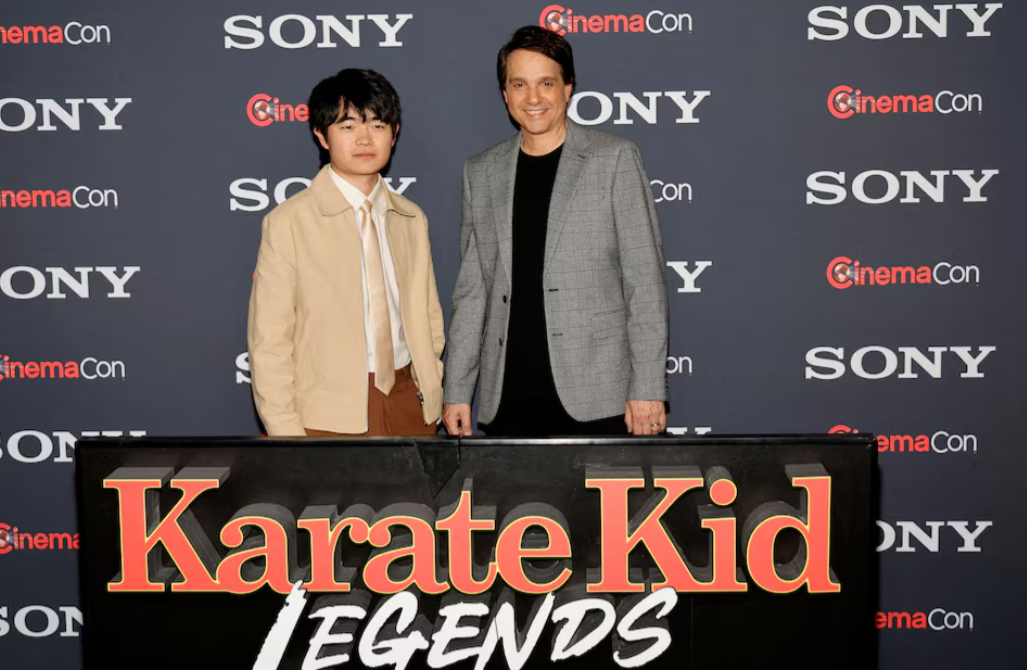 Ben Wang and Ralph Macchio pose as they promote the upcoming movie "Karate Kid: Legends," before a Sony Pictures presentation at CinemaCon, the official convention of Cinema United, in Las Vegas, Nevada, March 31, 2025.