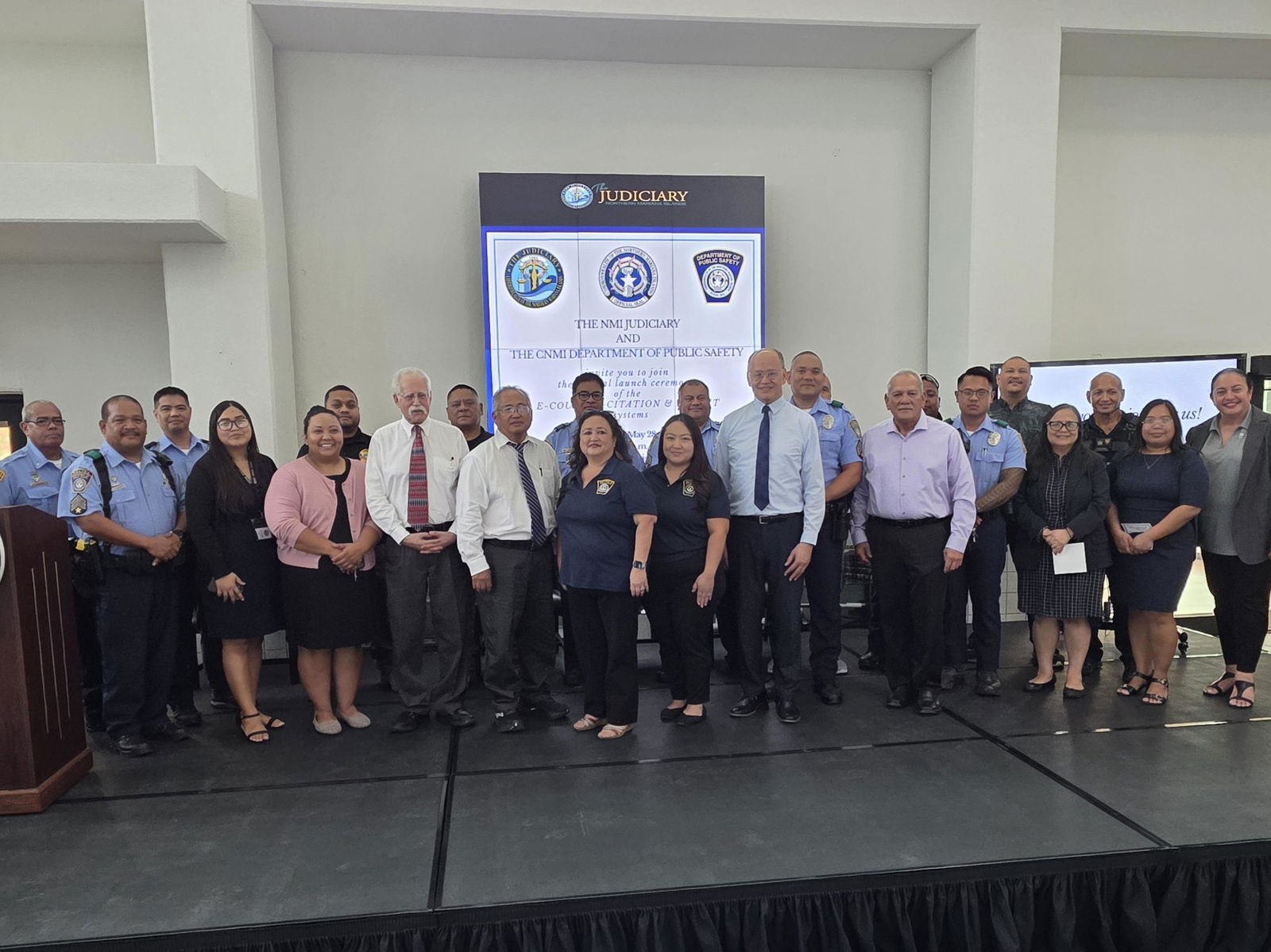 Attorney General Edward Manibusan and Rep. Diego Camacho join Judiciary and DPS officials at the launch of the E-Court, E-Citation, and E-PayIt systems on Wednesday.