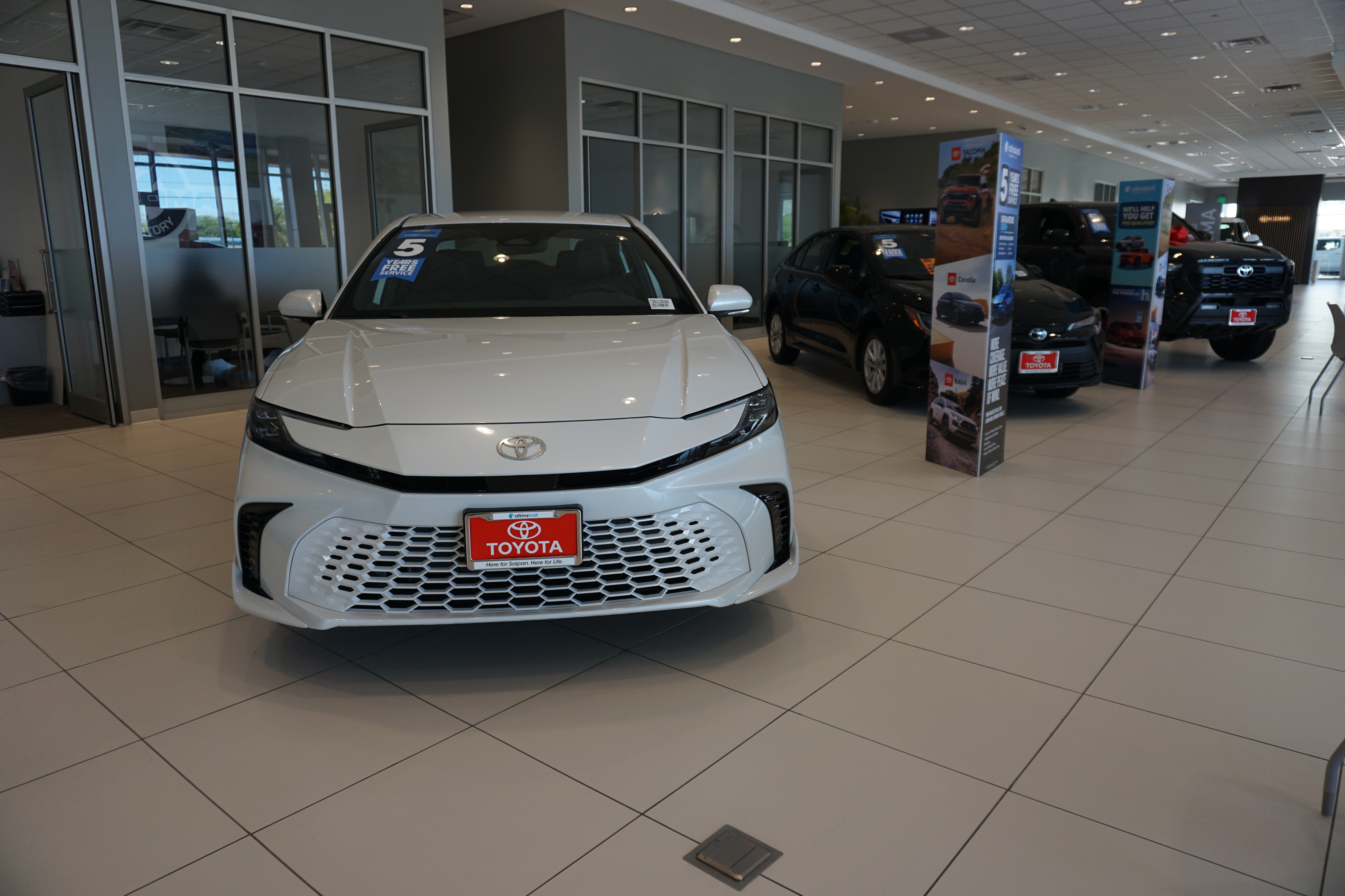 Kevin Barnes, Atkins Kroll Saipan's sales manager, can expect more test drives and calls now that the island's "prestige" sedan is available on Saipan. 