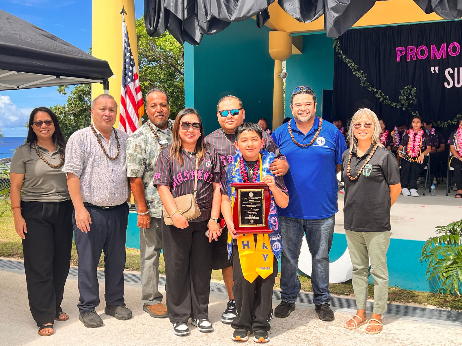 The Board of Education Academic Excellence Award was presented to Zaijan Lorenzo Curameng Hocog by BOE Chairman Aschumar Kodep Ogumoro-Uludong, Vice Chairman Anthony Barcinas, BOE member Andrew L. Orsini, BOE member Maisie B. Tenorio, and Teacher Representative Dr. Dora B. Miura. Also in photo are Hocog’s parents.