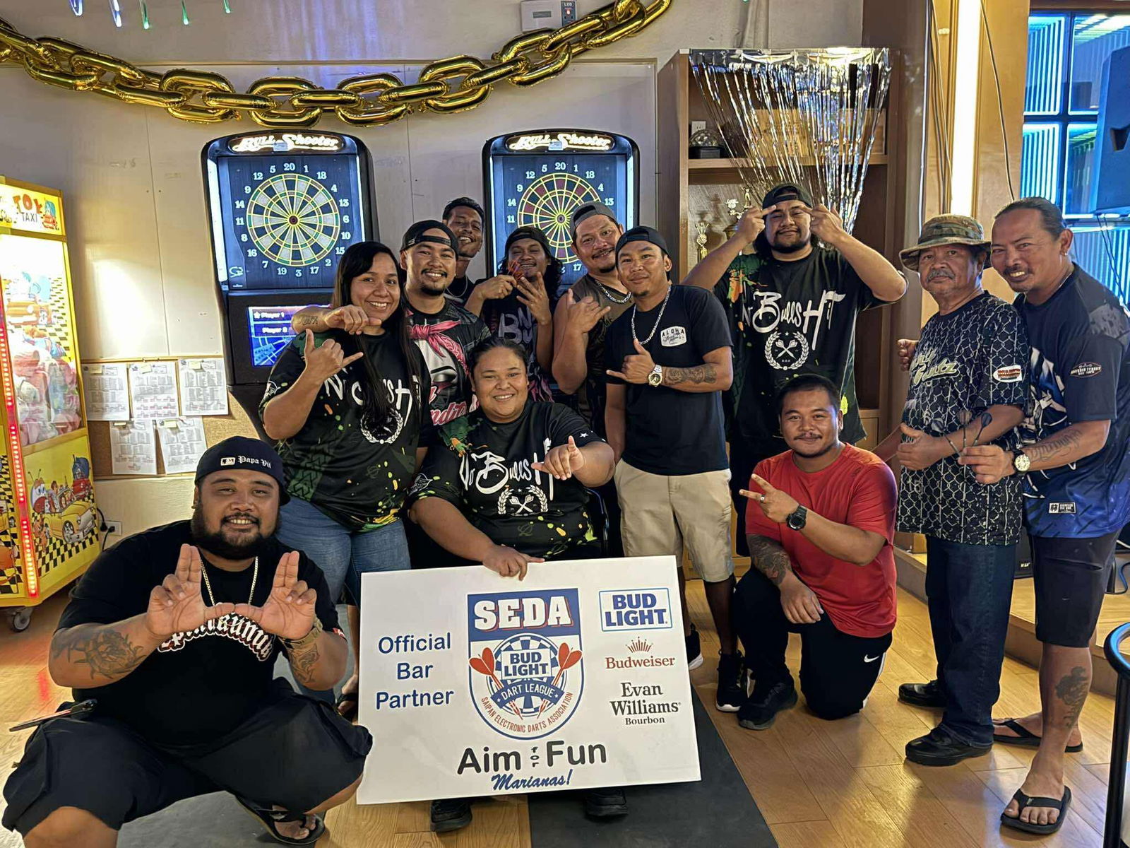 Bravo No Bulls Hit and Black 8 Darty Gentz players pose for a photo after their match in the Kingfisher C Division of the 2025 SEDA Bud Light Dart League at the True North Bar on Wednesday night.Contributed photo