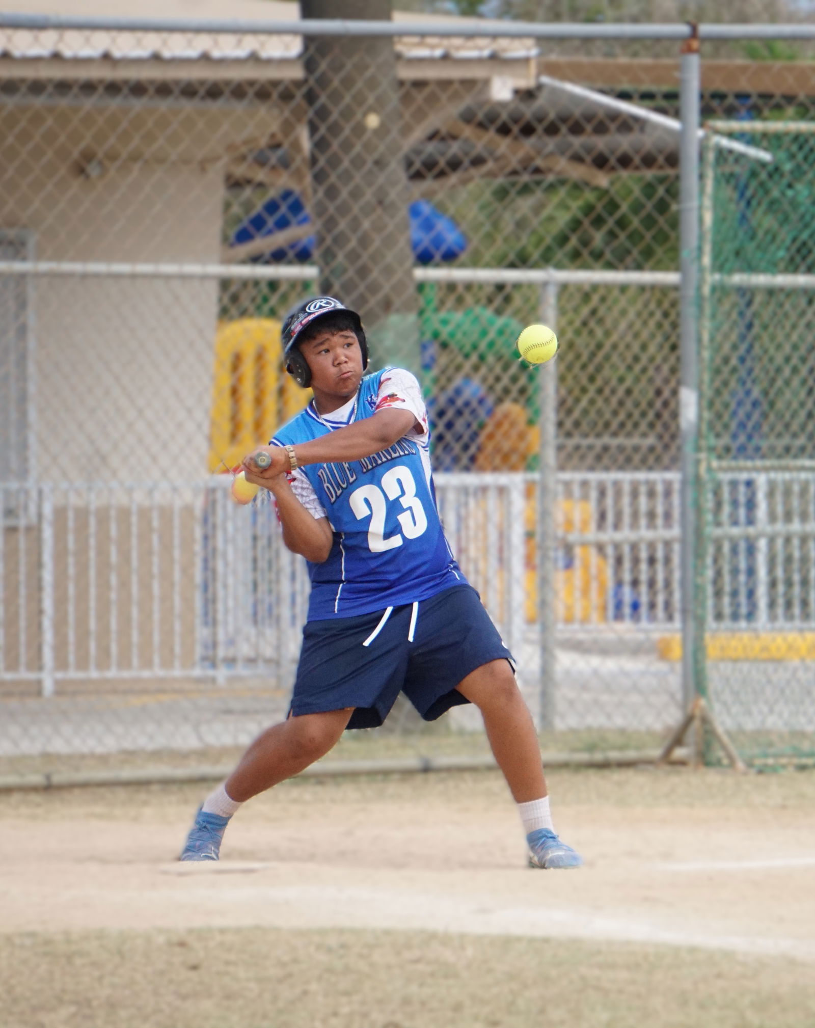 A Kagman Elementary School player swings and connects a hit against Koblerville Elementary School during the co-ed elementary school division title match of the PSS-NMISA Interscholastic Softball League SY24-25 at the Dandan softball field.Photo by James F. Sablan Jr.