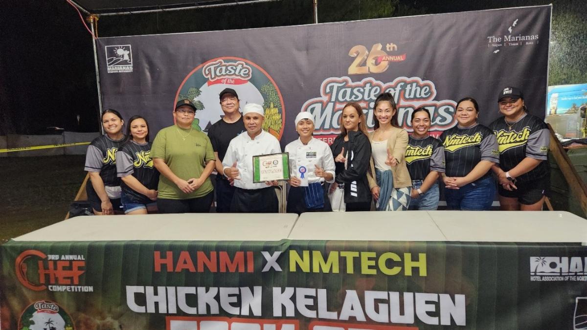 Romando Lagrio and Mary Kay Alferos, 5th and 6th from left, respectively, win 1st place in the HANMI-NMTech Chef’s Challenge at the 26th Annual Taste of the Marianas International Food Festival on May 24, 2025, at American Memorial Park, Saipan. Also pictured are representatives of Northern Marianas Technical Institute, HANMI, and judges.