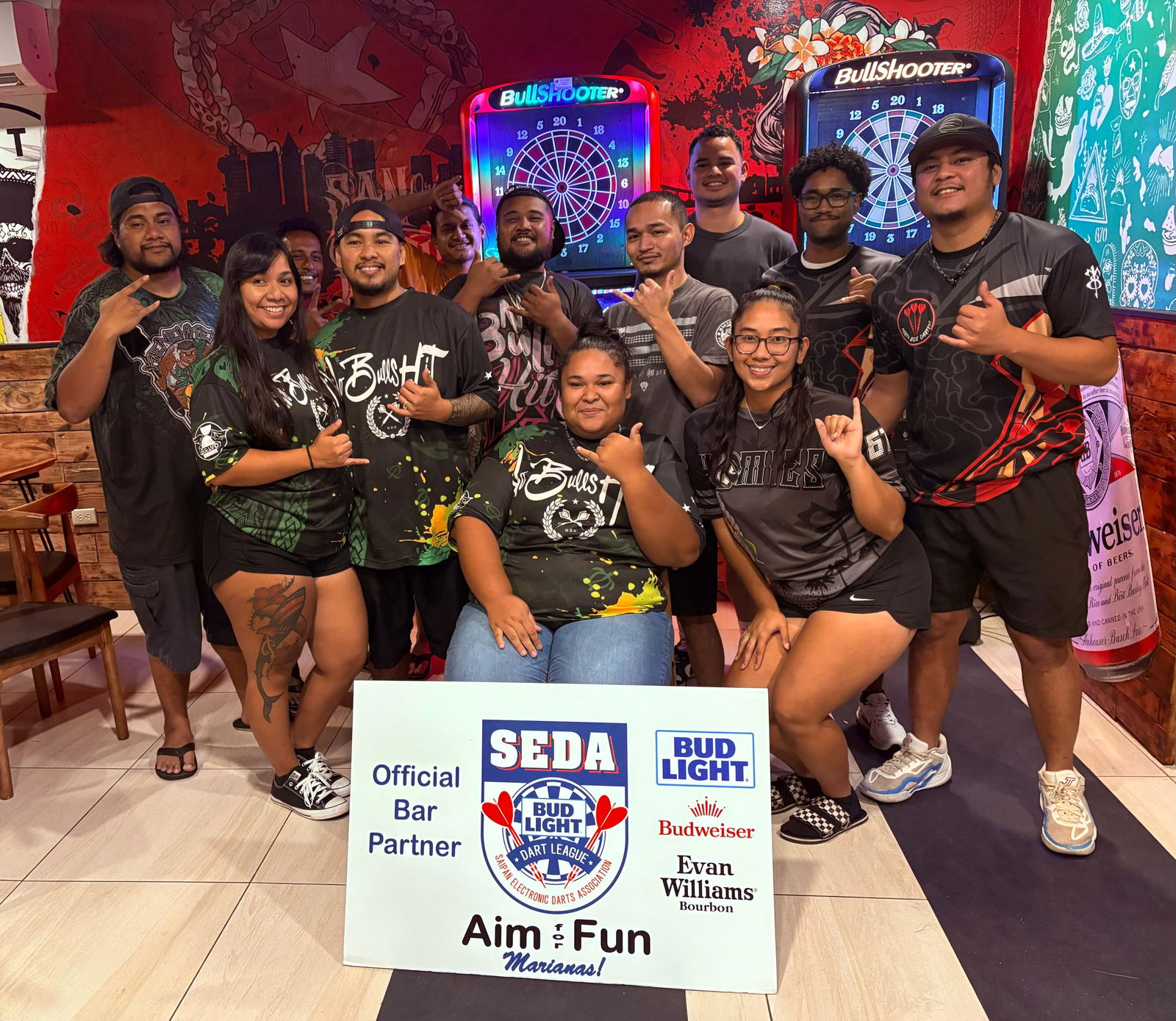 The Hut North Side Darterz and Bravo No Bulls Hit players pose for a group photo after Wednesday's game in the Kingfisher C Division of the 2025 SEDA Bud Light Dart League at The Hut.Contributed photo