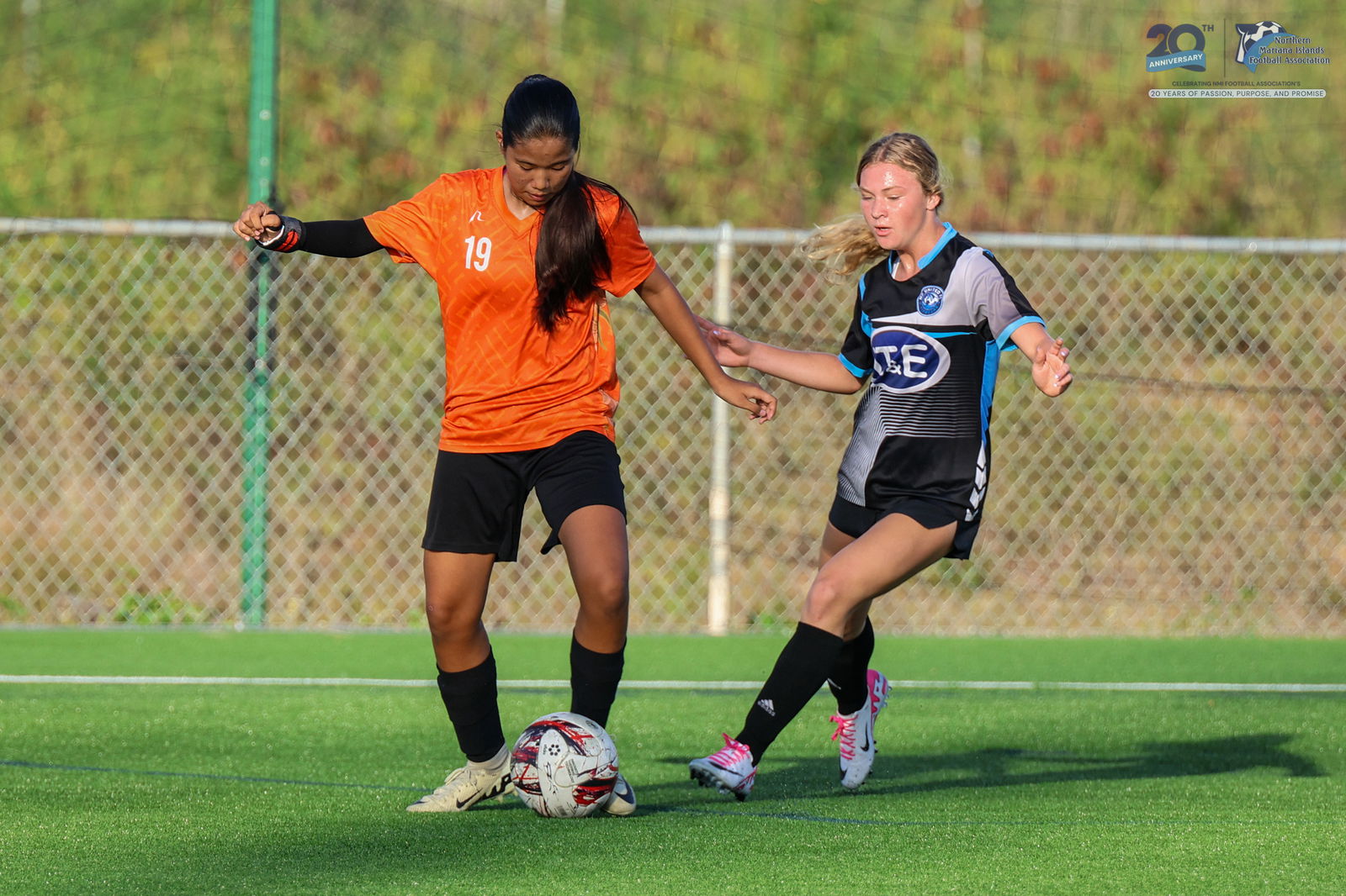 Kanoa’s Ye Lynn Ha battles for the possession against MP United during the U17 girls division title match of the TakeCare Youth Soccer League Spring 2025 at the NMI Soccer Training Center in Koblerville on Saturday.