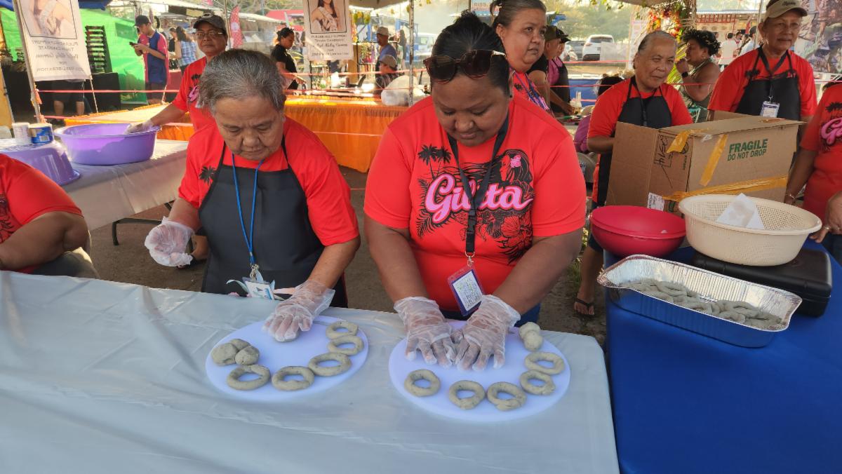 The Rota Mayor’s Office offers free samples of “bunuelos kamuti” at the 26th Annual Taste of the Marianas International Food Festival on May 17, 2025, at American Memorial Park, Saipan.