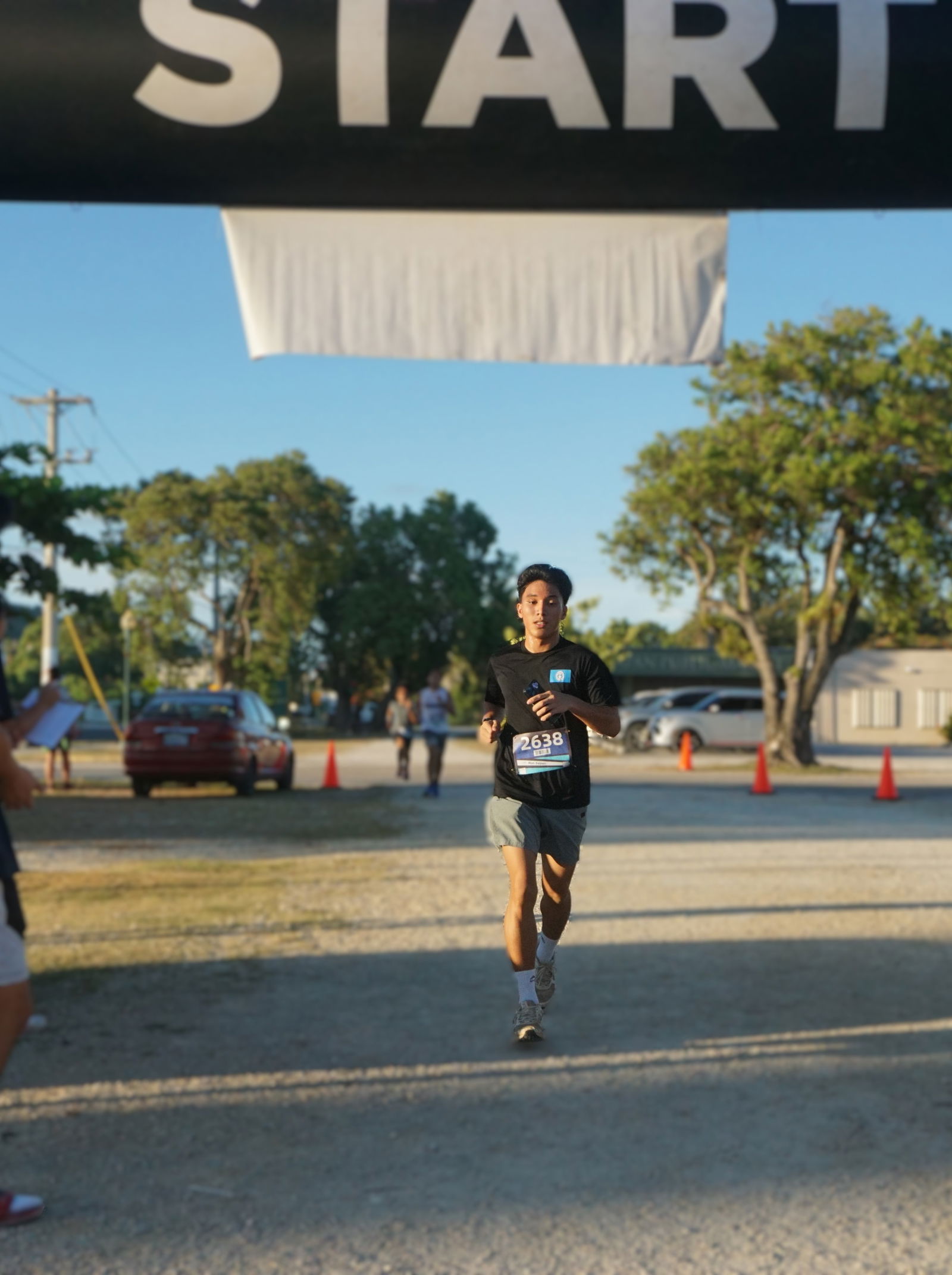 Dave Odicta makes his way toward the finish line in the men’s division of the Rotaract Club of Saipan’s 5K Memorial Day Rotaract Fun Run at the Garapan Fishing Base on Saturday morning.Photo by James F. Sablan Jr.