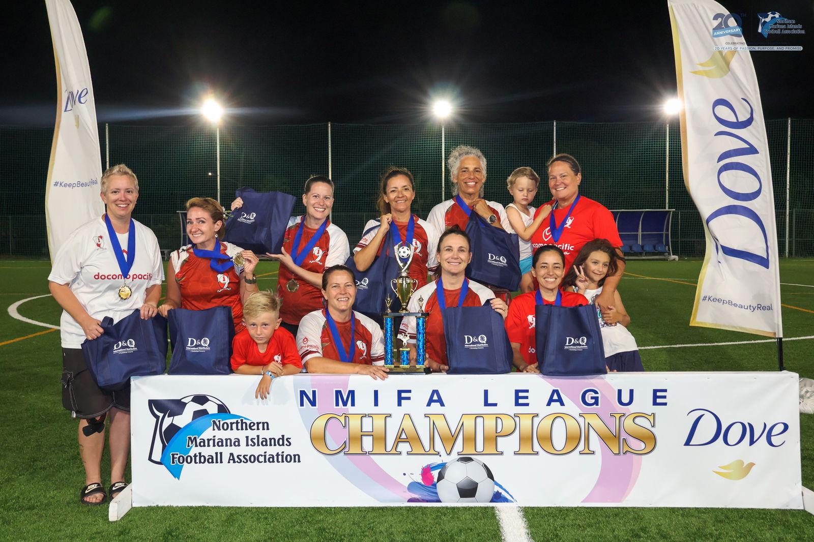 Paire Football Club players pose with the masters division championship trophy during the awards ceremony of the Dove Women's League SY24-25 at the NMI Soccer Training Center in Koblerville on Sunday, May 4.NMIFA photo