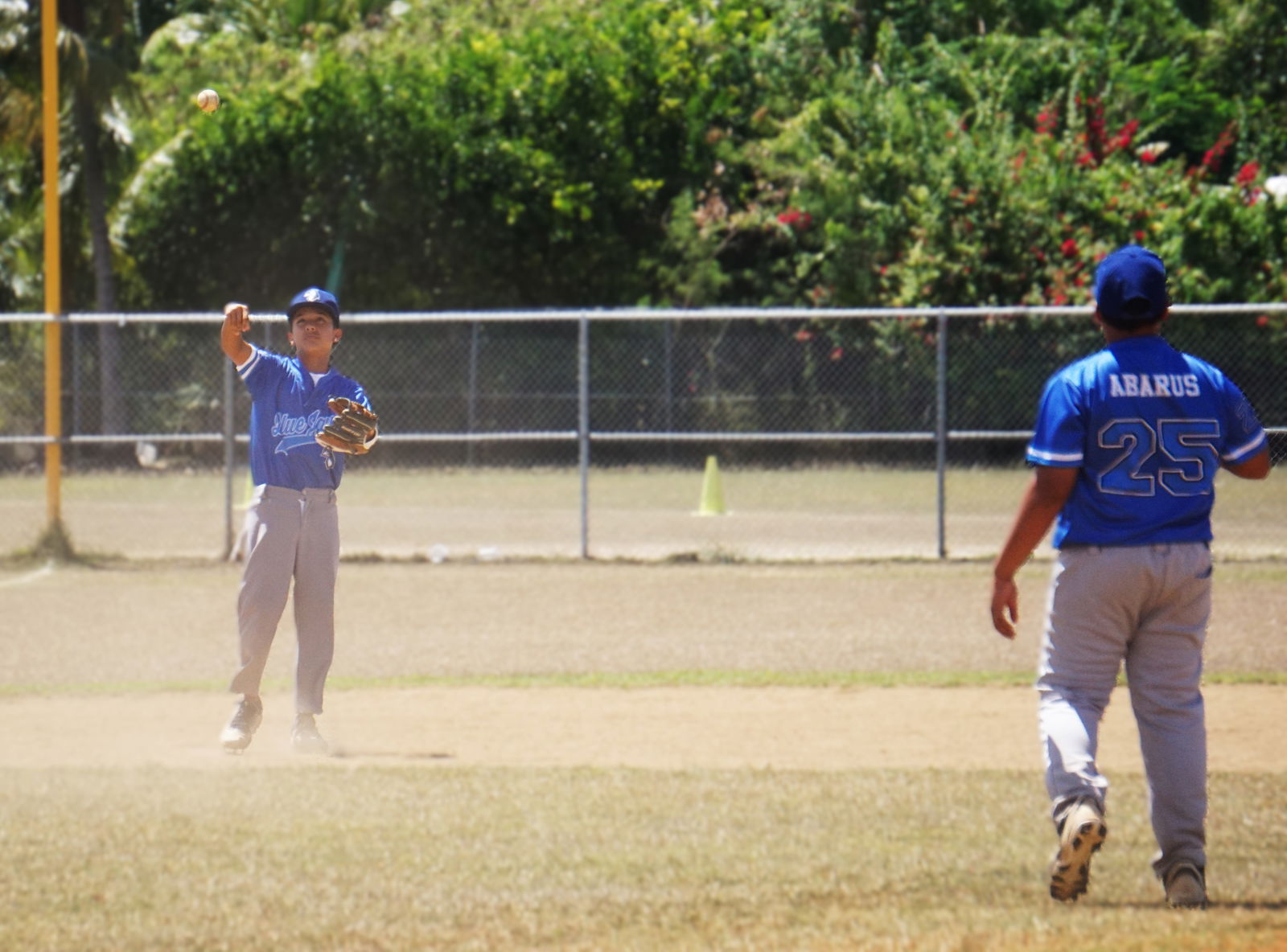 Blue Jays Jr. shortstop Francisco Maratita returns the ball to the pitcher after a successful pick off during a game against Bears Jr. in the junior division of the 2025 Saipan Little League Baseball at the Francisco "Tan Ko" Palacios Baseball Field on Saturday.Photo by James F. Sablan Jr.